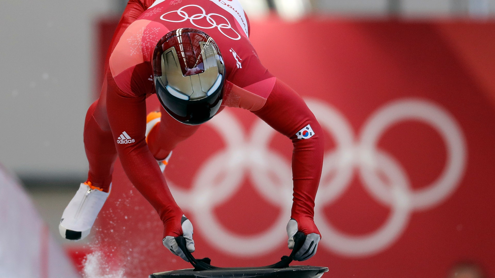 Gold medlaist Sungbin Yun of South Korea starts his first run during the men's skeleton competition at the 2018 Winter Olympics