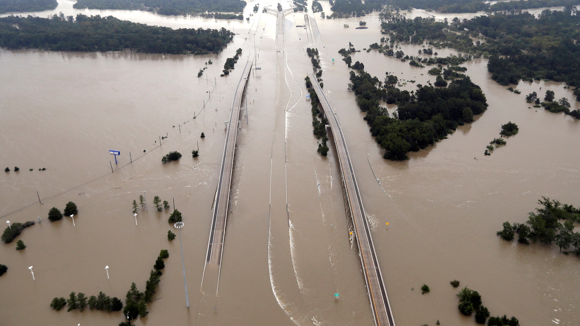 Interstate 69 is covered by floodwaters from Tropical Storm Harvey Tuesday, in Humble, Texas