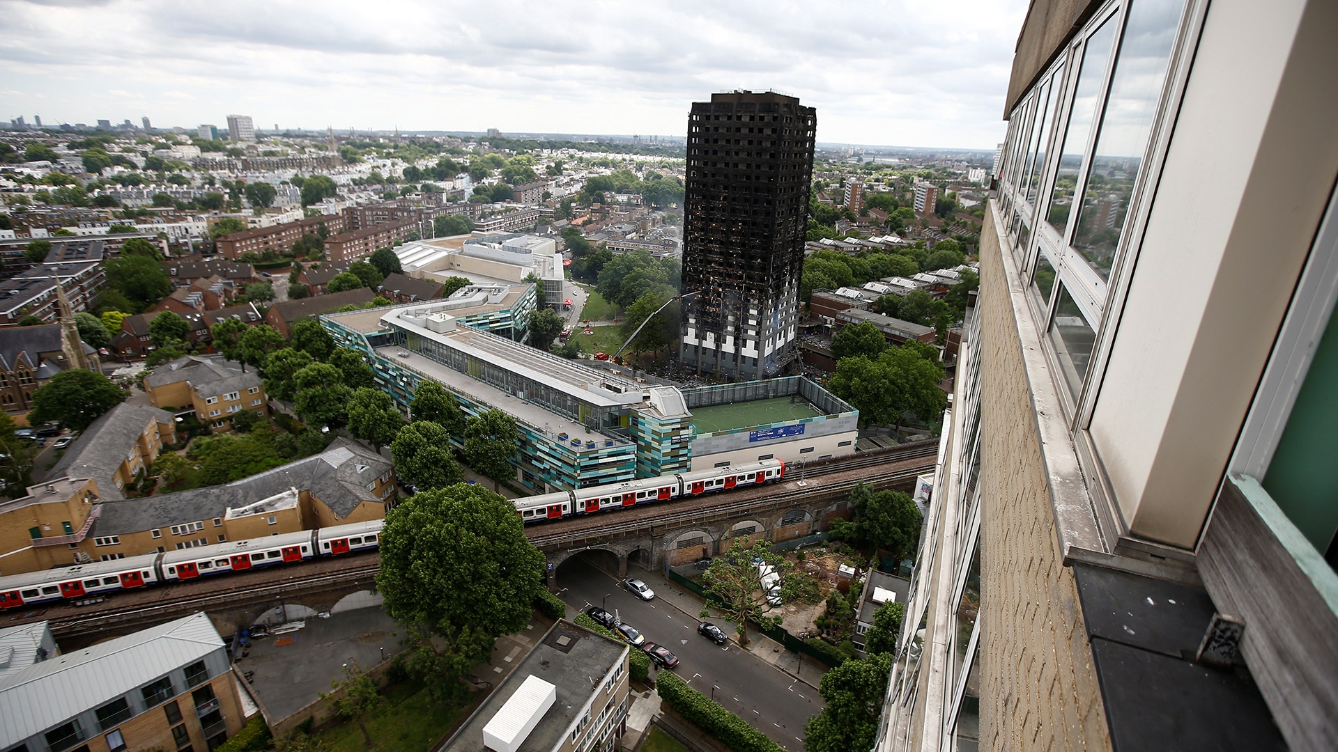 Damage is seen to the apartment building destroyed in a fire in north Kensington, West London