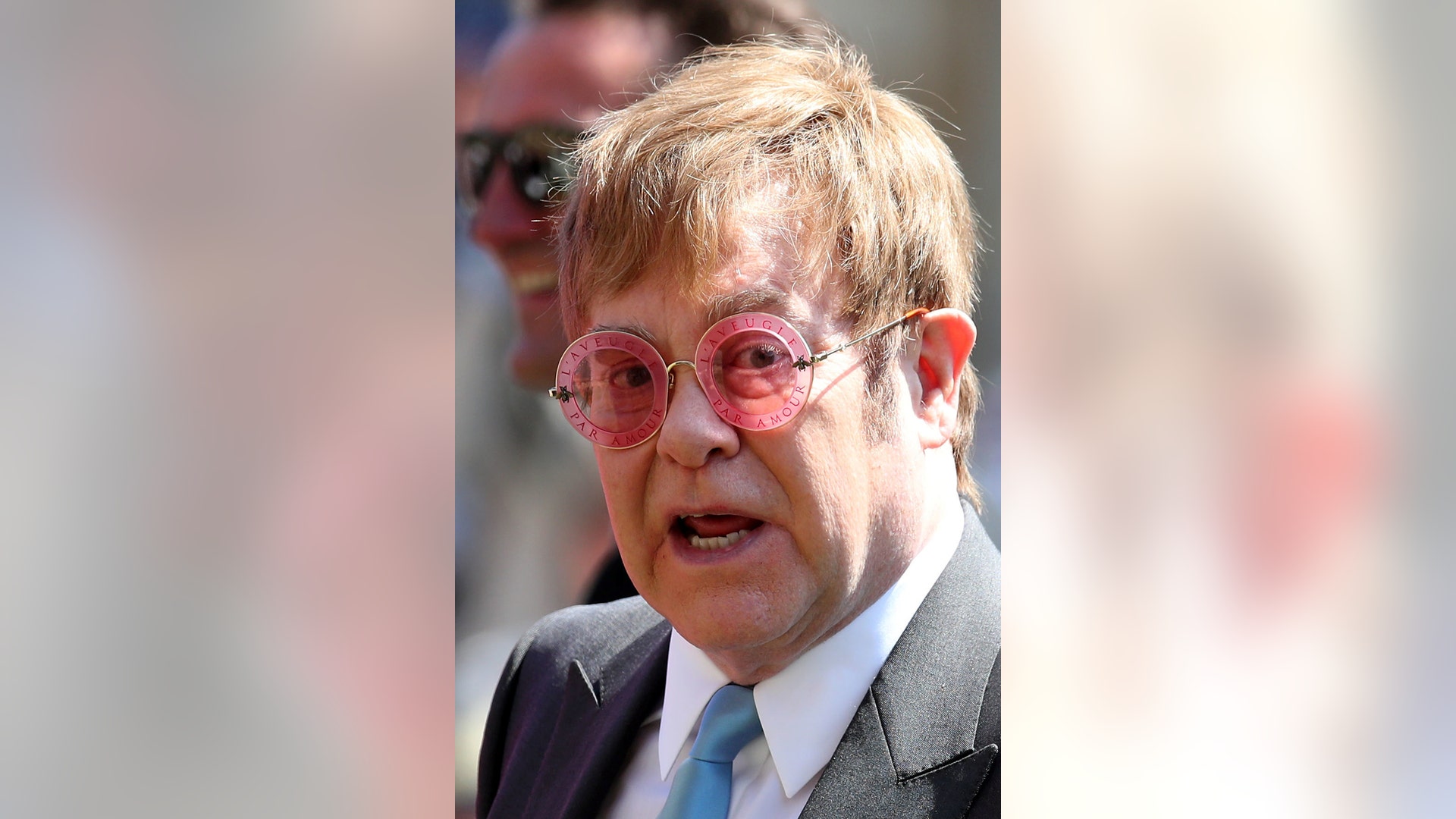 Elton John leaves St George's Chapel at Windsor Castle after the wedding of Meghan Markle and Prince Harry