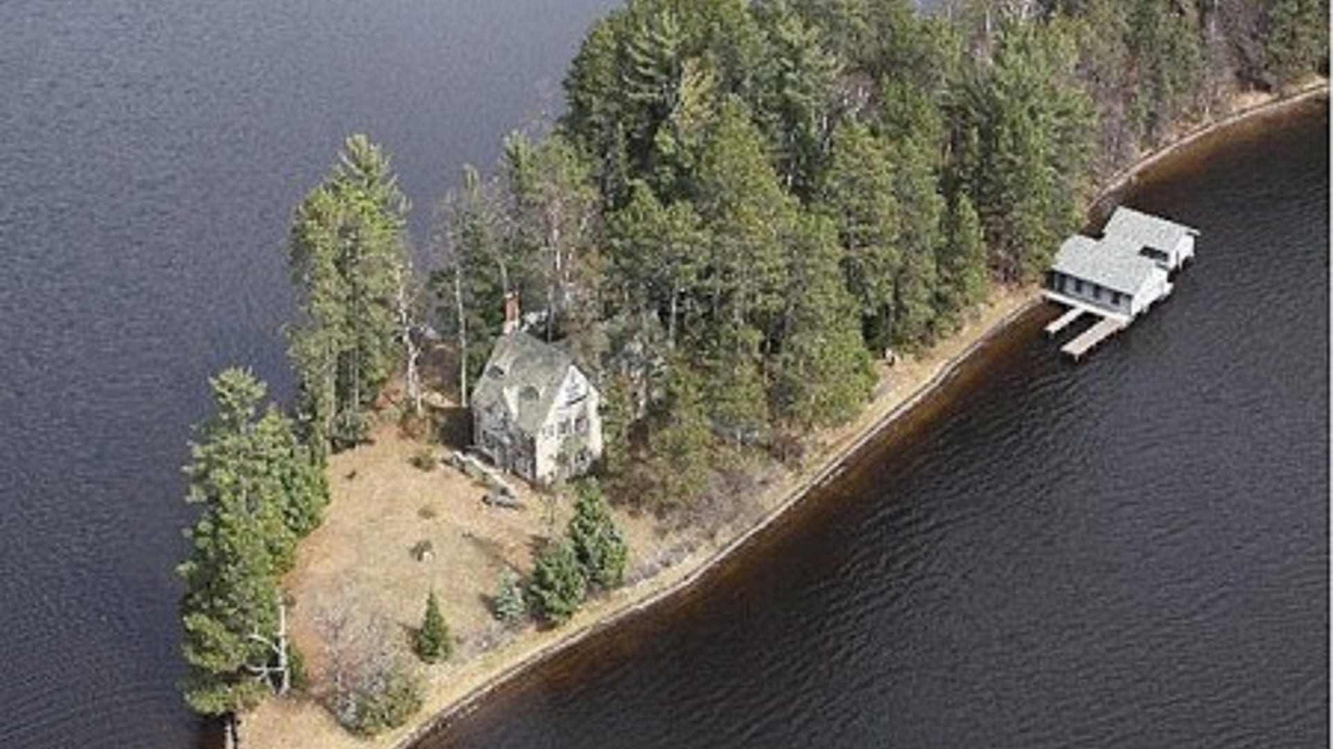 1300 State Highway 32, Three Lakes, WI. For Sale: $1,950,000. Forget one island, how about three? Three islands create the barrier between Wisconsin’s Laurel and Medicine Lakes and they’re looking for new owners. The west island holds two boathouses and the main home, a 5-bedroom, 4-bath stone house built in 1934. The home features white oak floors and a stone wood burning fireplace, but, according to the property listing, the home is in need of updates. The middle island holds various outbuildings, and the east island is mostly lowland, home to much of the area’s wildlife. So, what’s the cost of island living in Three Lakes, WI? This home was previously listed on the Three Lakes real estate market for $4.2 million; a recent price cut dropped it down 53.6 percent to $1.95 million.