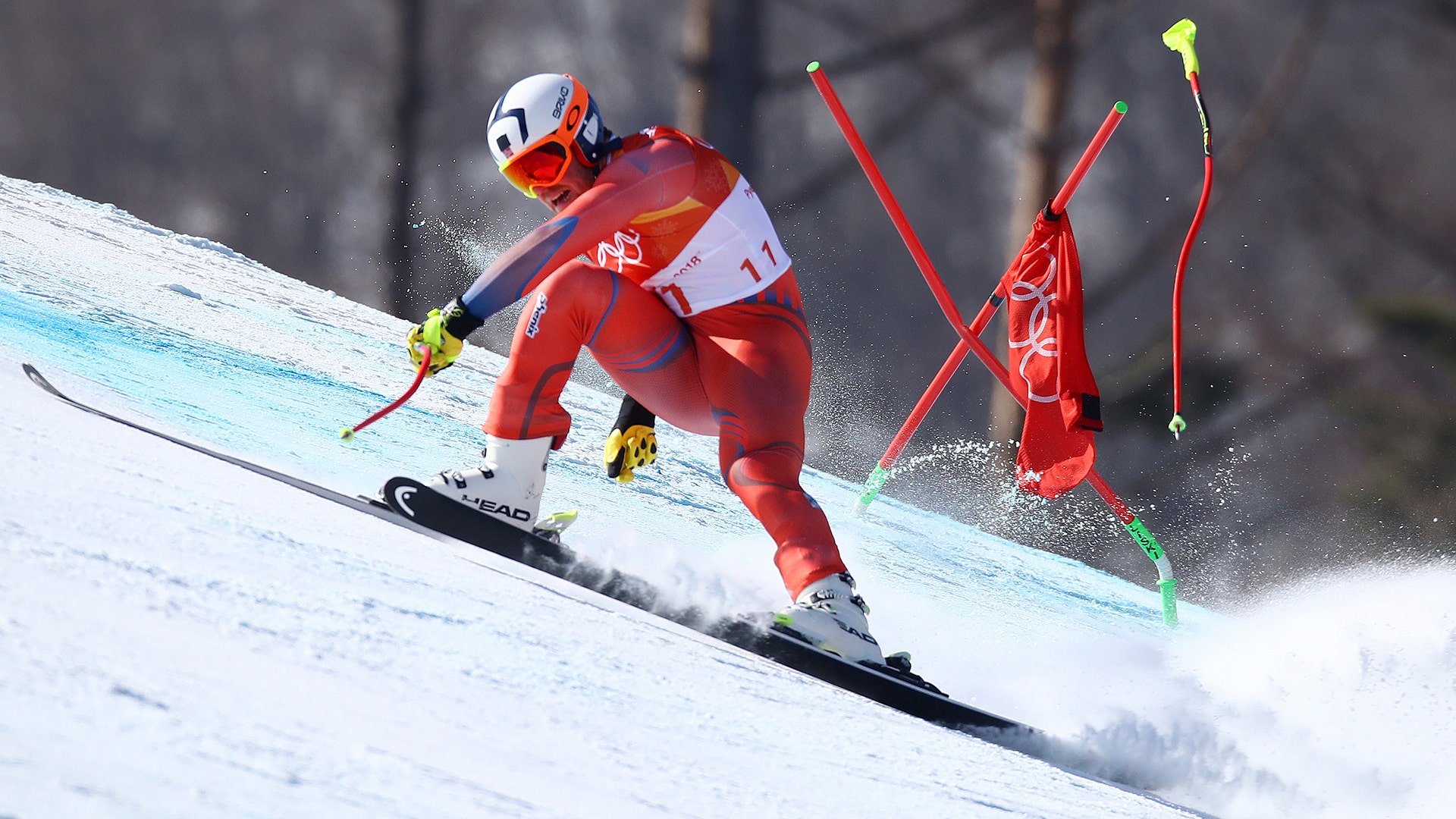 Norway's Aleksander Aamodt Kilde loses a ski pole after hitting a gate during the men's super-G at the 2018 Winter Olympics
