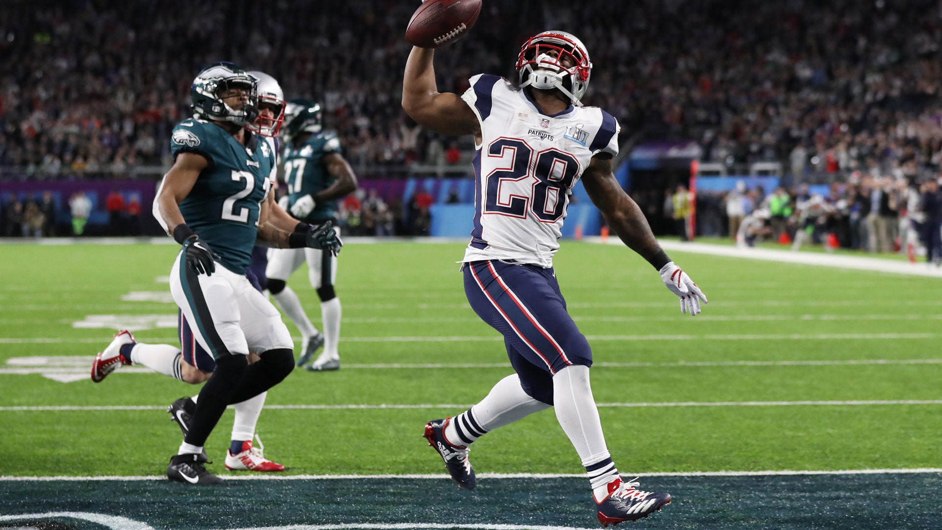 New England Patriots' James White scores a touchdown in the first half of Super Bowl 52 against the Philadelphia Eagles