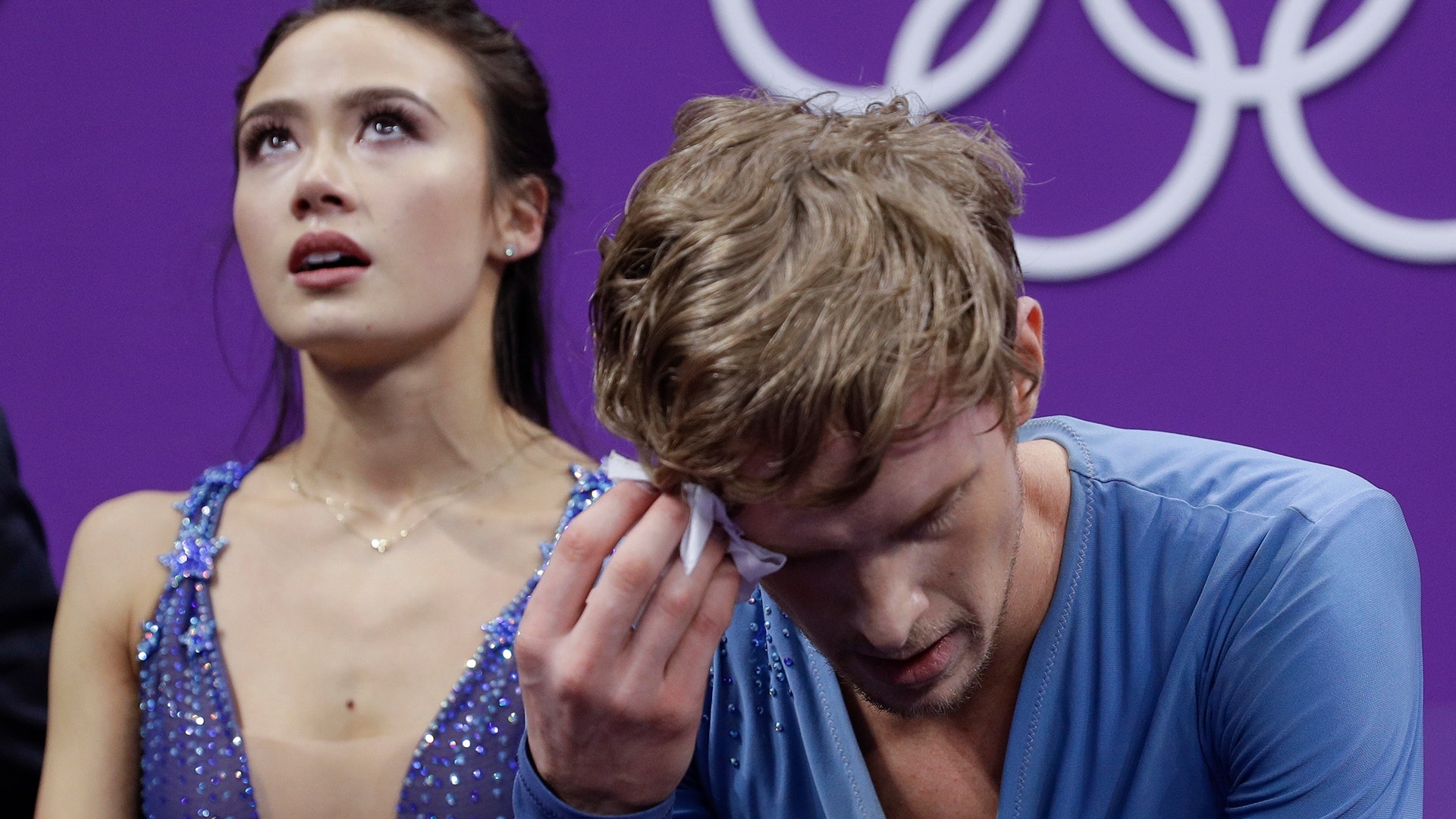 Madison Chock and Evan Bates of the United States  following their performance in the ice dance, free dance figure skating final 