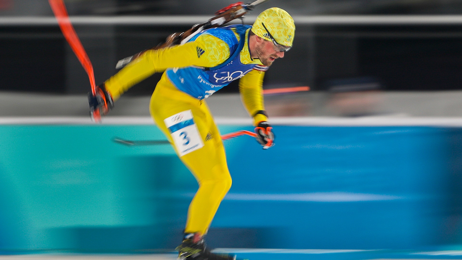 Fredrik Lindstroem of Sweden, skis to a gold medal in the men's 4x7.5-kilometer biathlon relay at the 2018 Winter Olympics