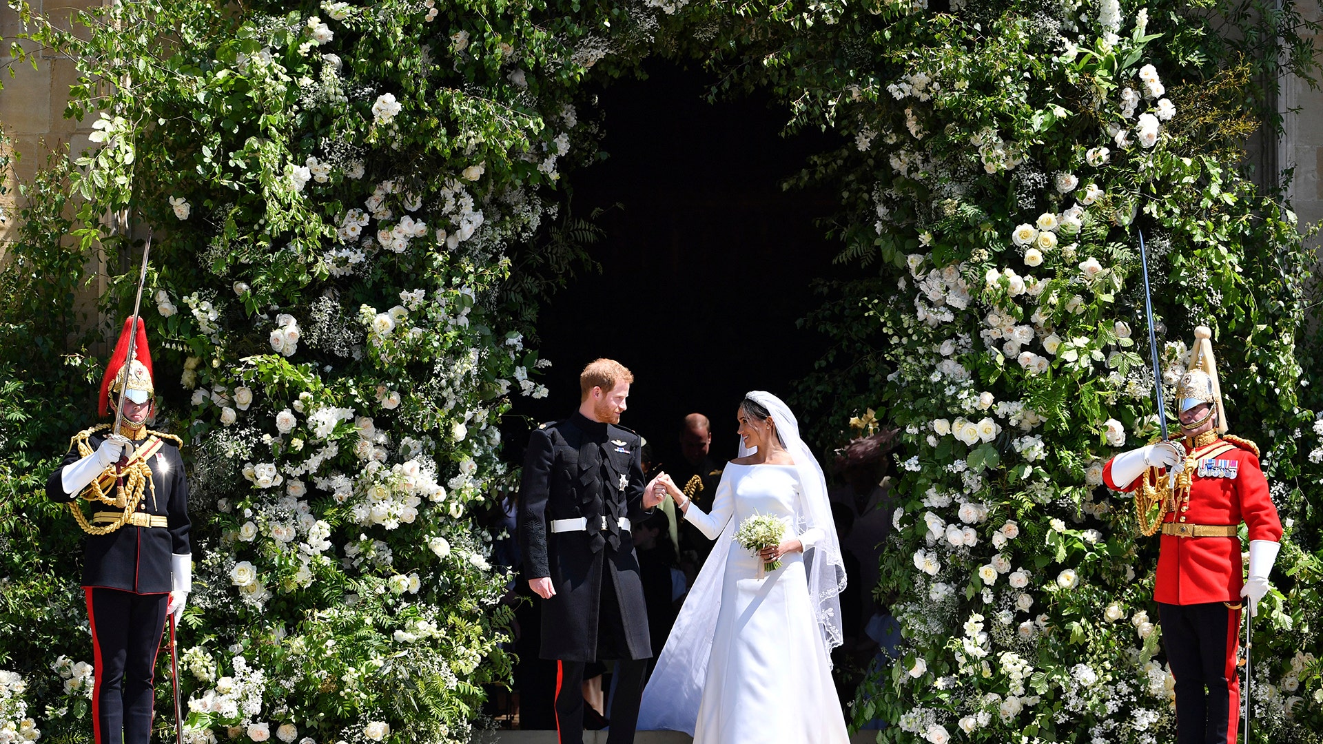 Prince Harry and Meghan Markle leave after their wedding ceremony at St. George's Chapel in Windsor Castle