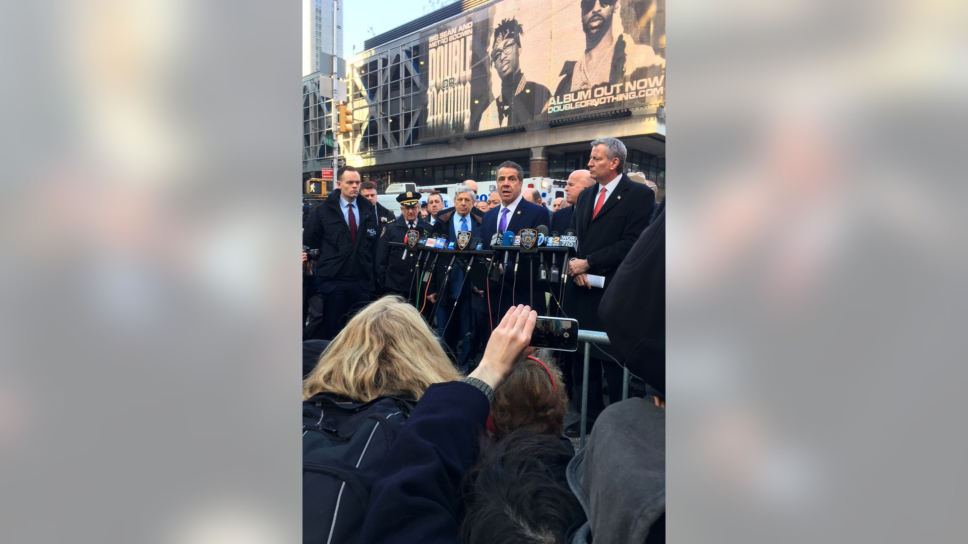 Governor Andrew Cuomo and Mayor Bill De Blasio speak outside the Port Authority Bus Terminal in New York City, Monday