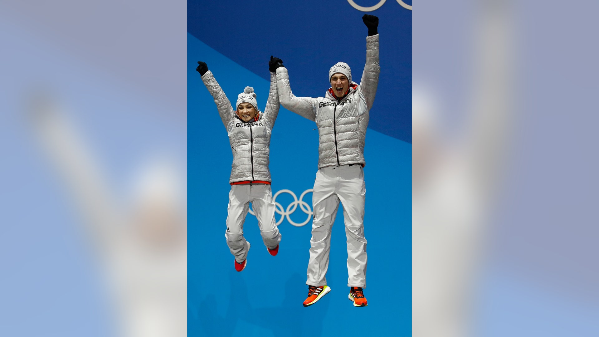 Gold medalists in pairs figure skating, Aljona Savchenko and Bruno Massot of Germany during the medal ceremony