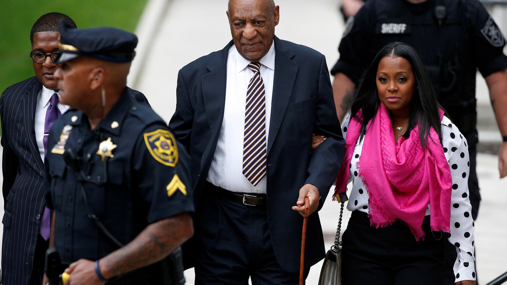 Bill Cosby arrives for the first day of his sexual assault trial at the Montgomery County Courthouse with actress Keshia Knight Pulliam on June 5, 2017.