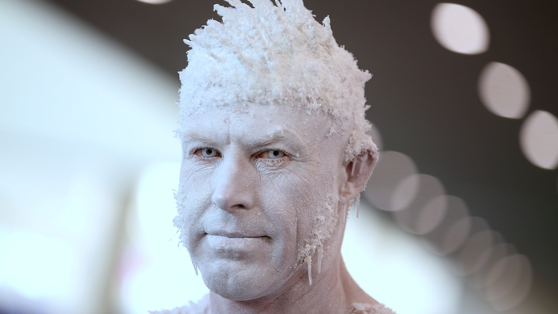 Todd Schmidt of San Diego poses for a picture during opening day of Comic-Con International in San Diego