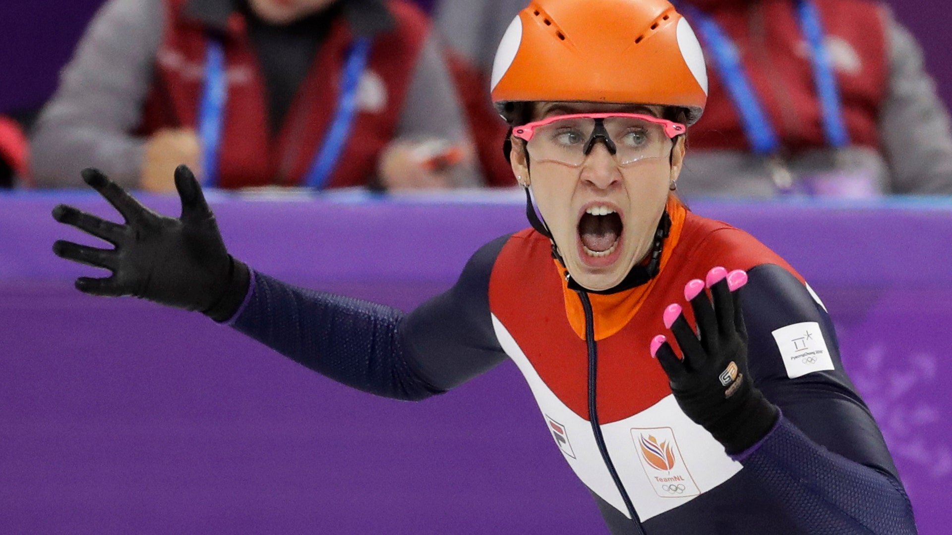 Suzanne Schulting of the Netherlands winning the women's 1000 meters short track speed skating final at the Winter Olympics