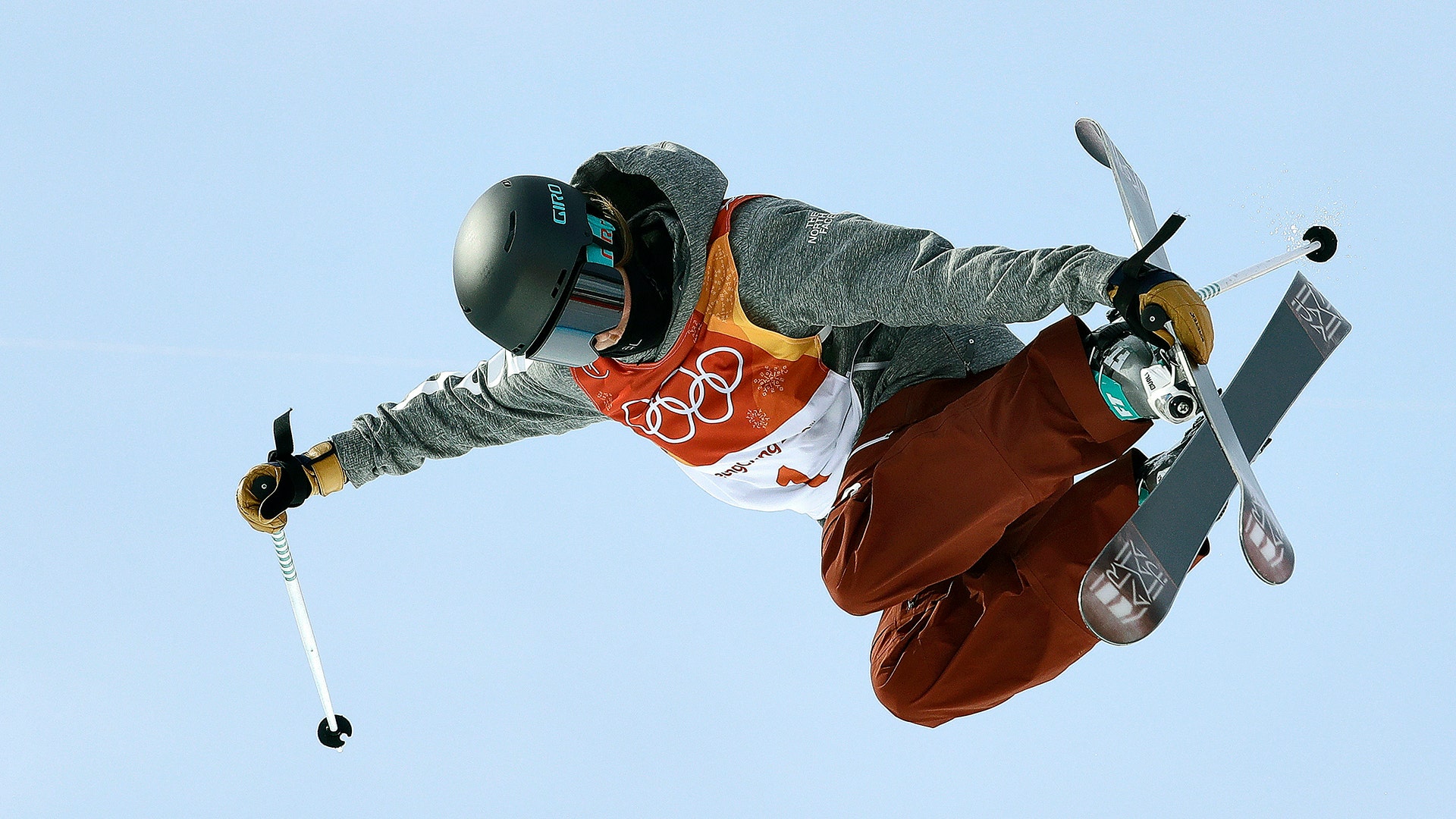 Freestyle skier Brita Sigourney, of the United States, jumps during women's halfpipe qualifying at the 2018 Winter Olympics in Pyeongchang