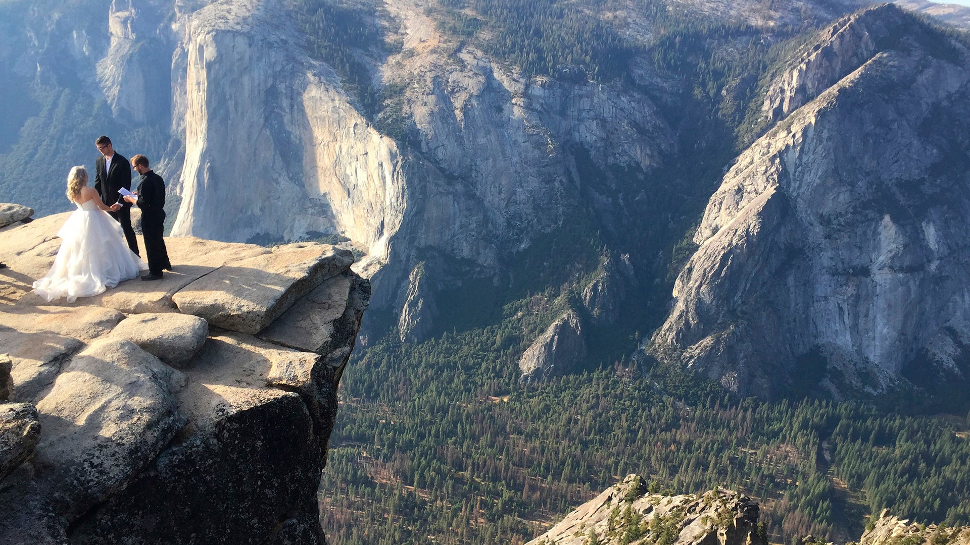 A couple gets married at Taft Point in California's Yosemite National Park, September 27, 2018