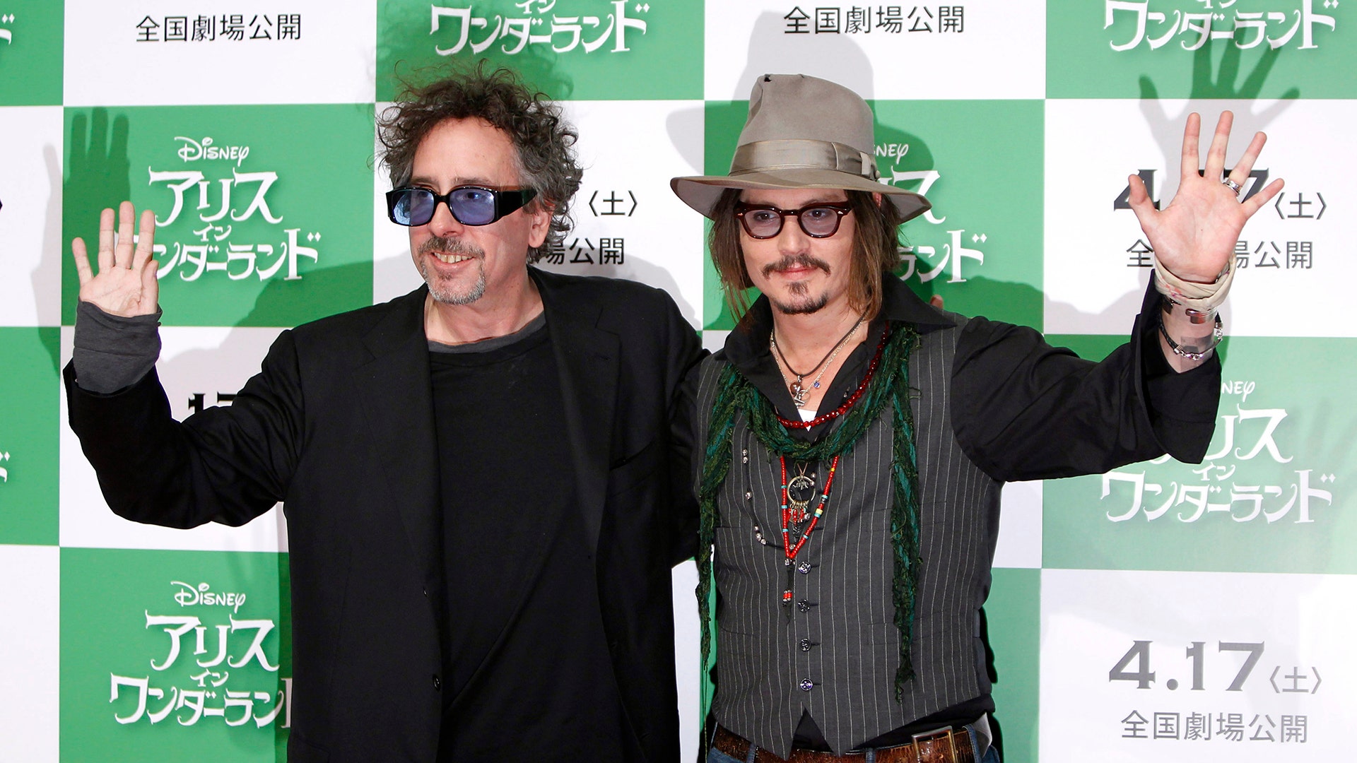 With longtime collaborator, director Tim Burton promoting the movie 