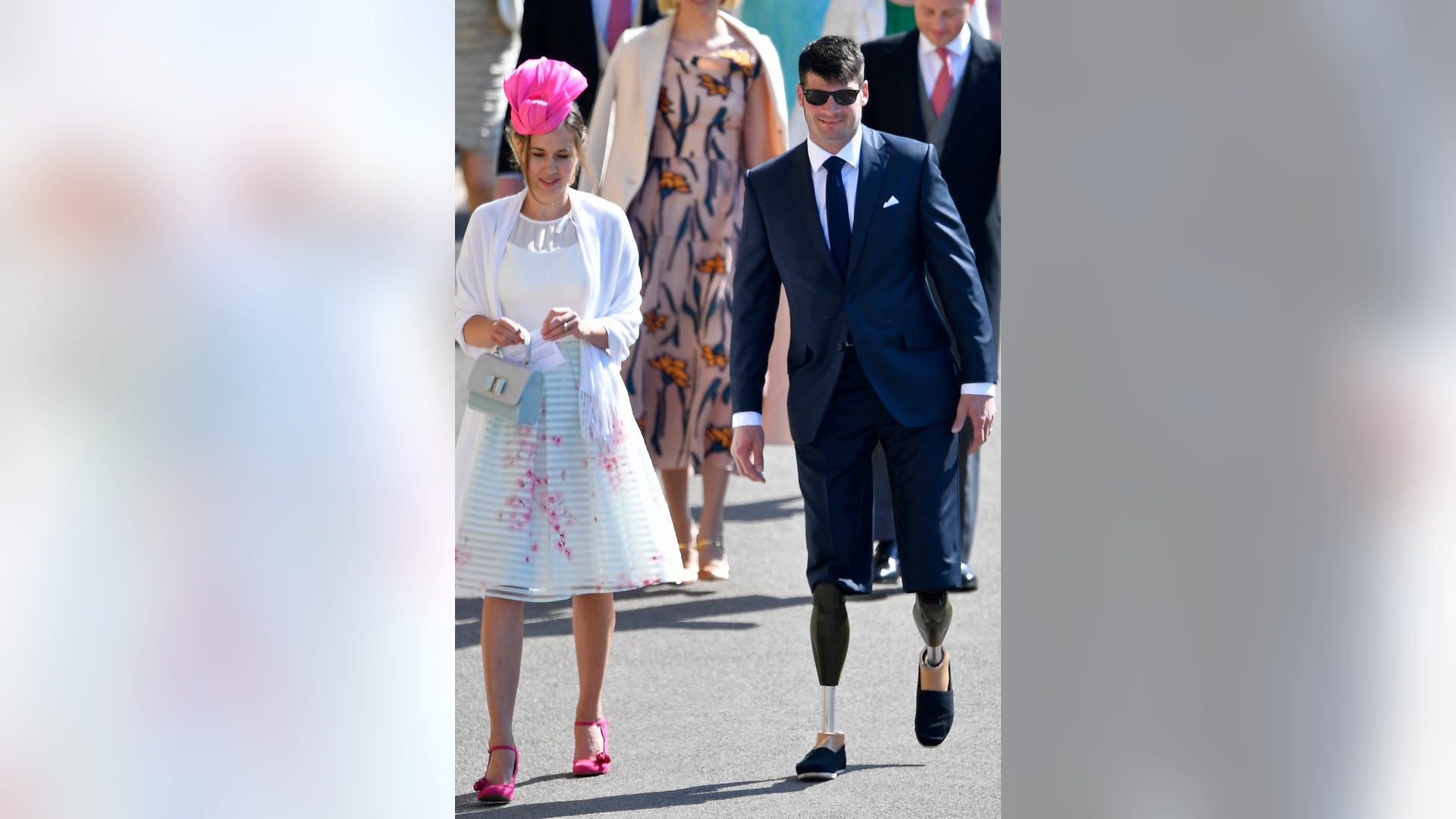 Dave Henson, British para-sport athlete, arrives with guests for the wedding ceremony