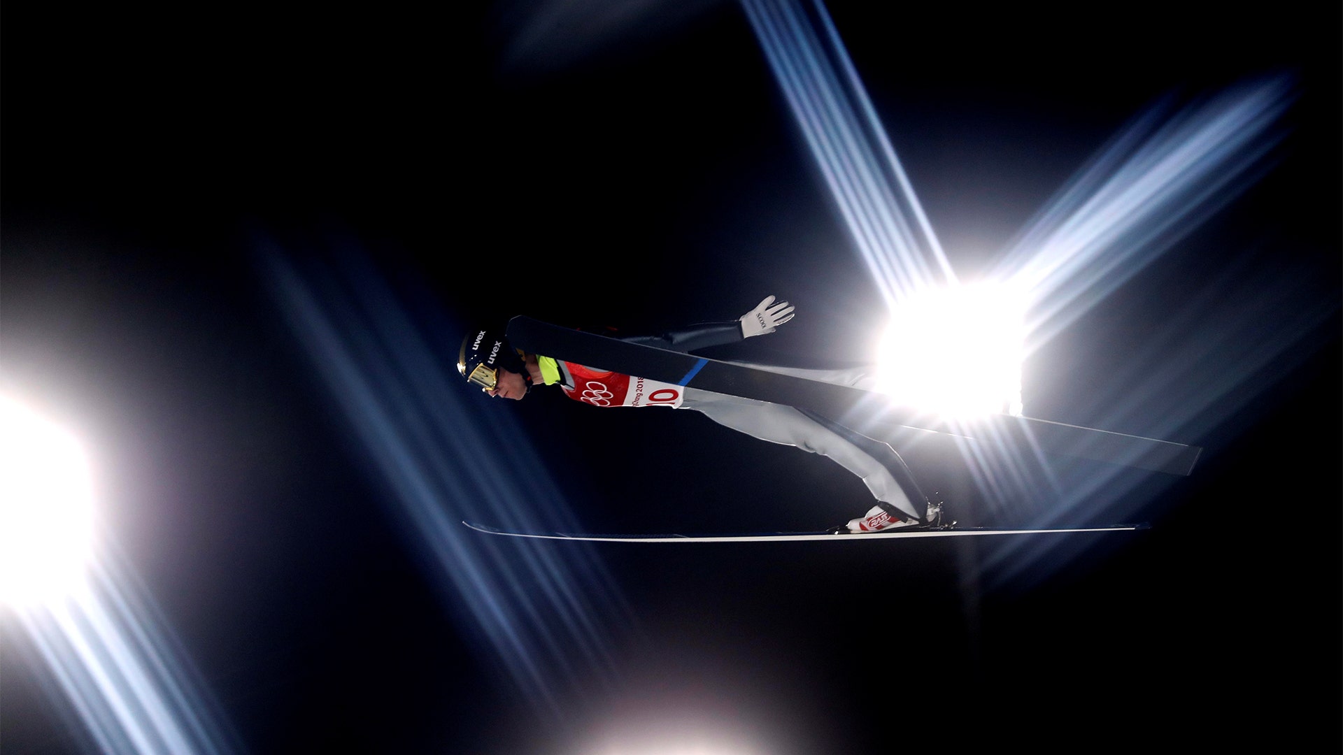 Olympic athlete from Russia Alexey Romashov in action during the  Men Large Hill ski jumping