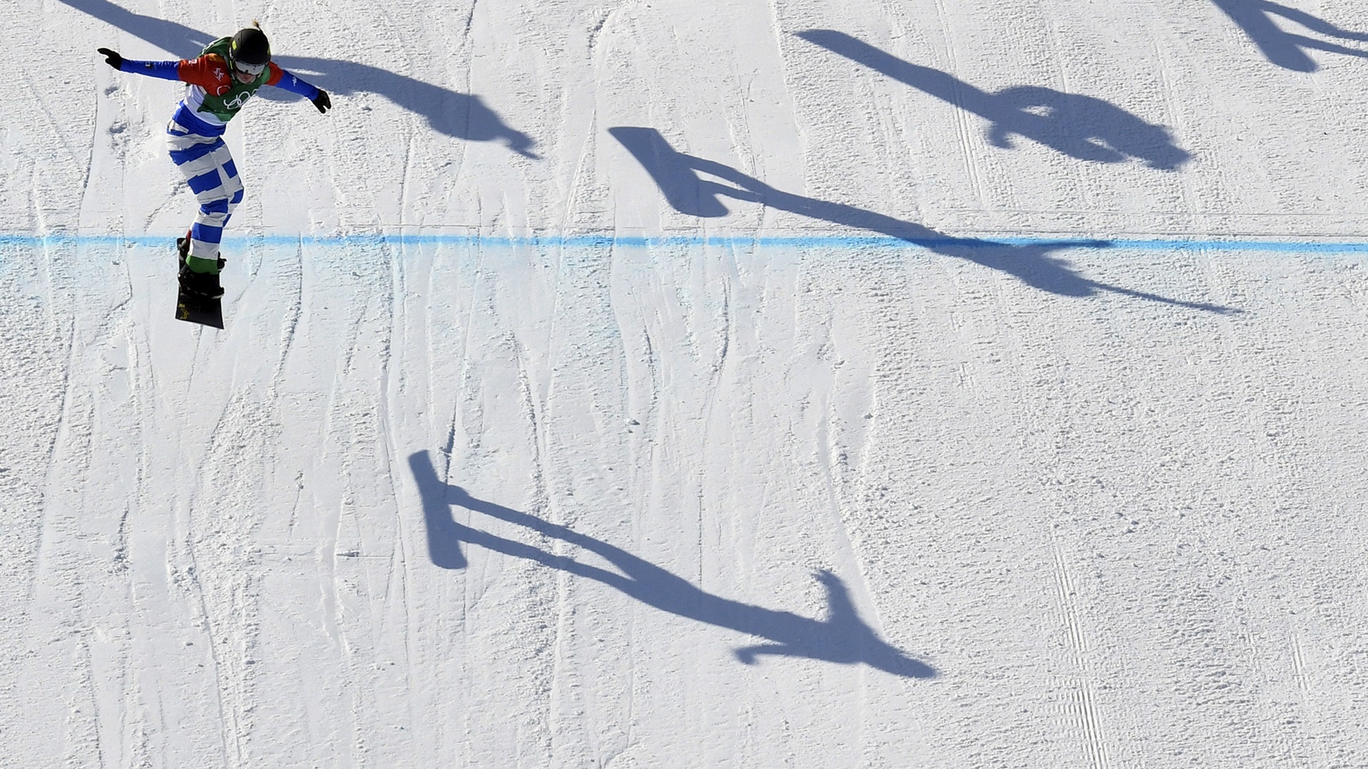 Michela Moioli of Italy, winning the gold medal in women's snowboard cross at the 2018 Winter Olympics in Pyeongchang