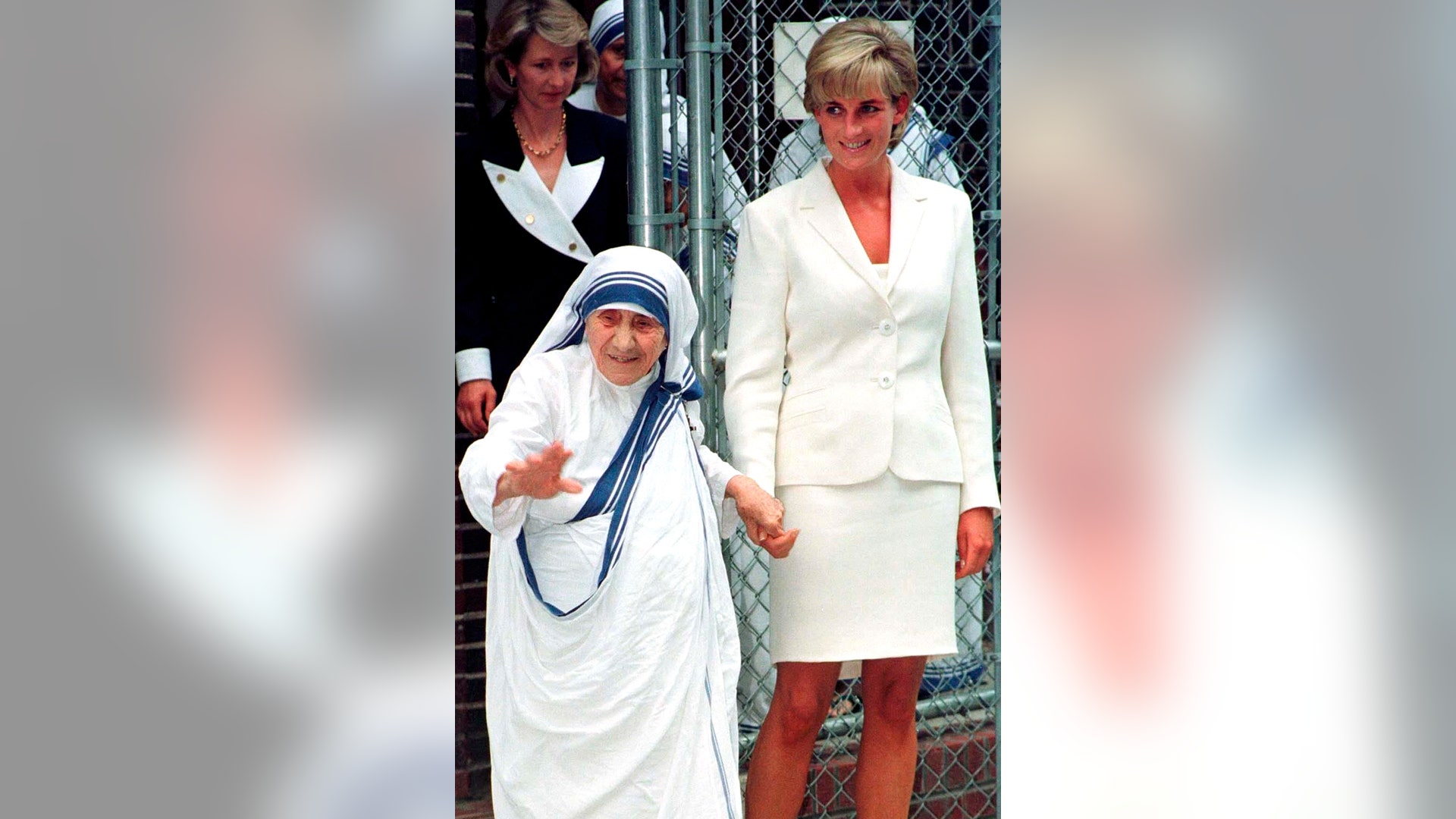 Diana, Princess of Wales holds hands with Mother Teresa in New York City, June 18, 1997