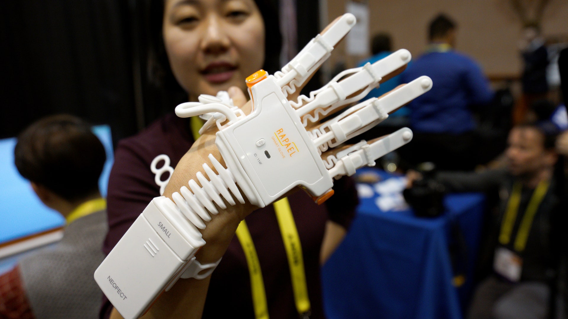Anna Choi of Neofect demonstrates the Rapael Smart Glove therapy device for stroke victims at CES in Las Vegas.