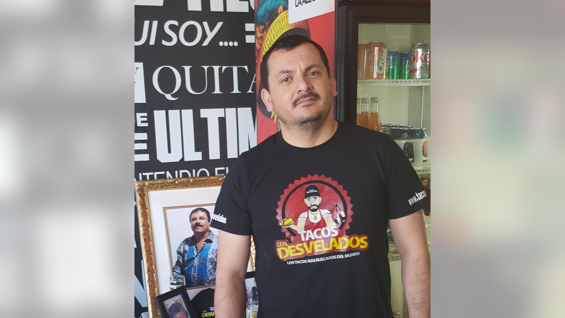 Fabricio Ramirez next to chapo altar