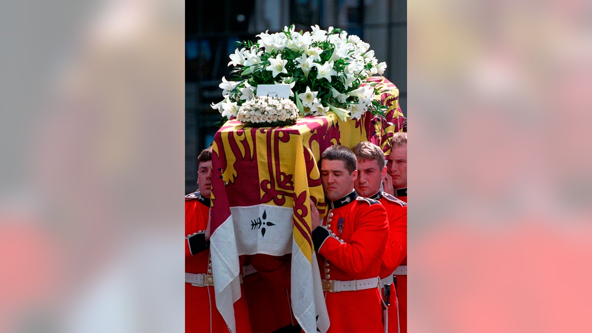 Princess Diana's casket is carried out of Westminster Abbey after her funeral in London, September 6, 1997