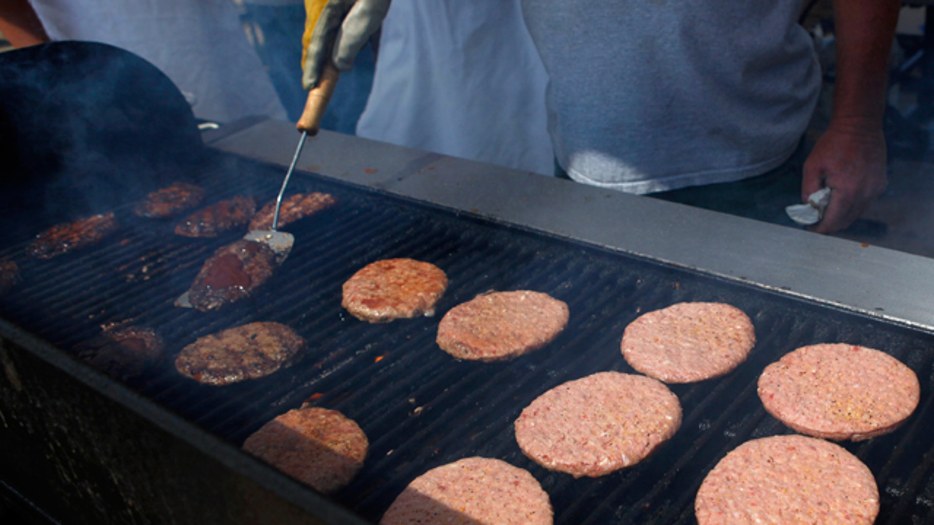 Burger meat on a Grill, Reuters