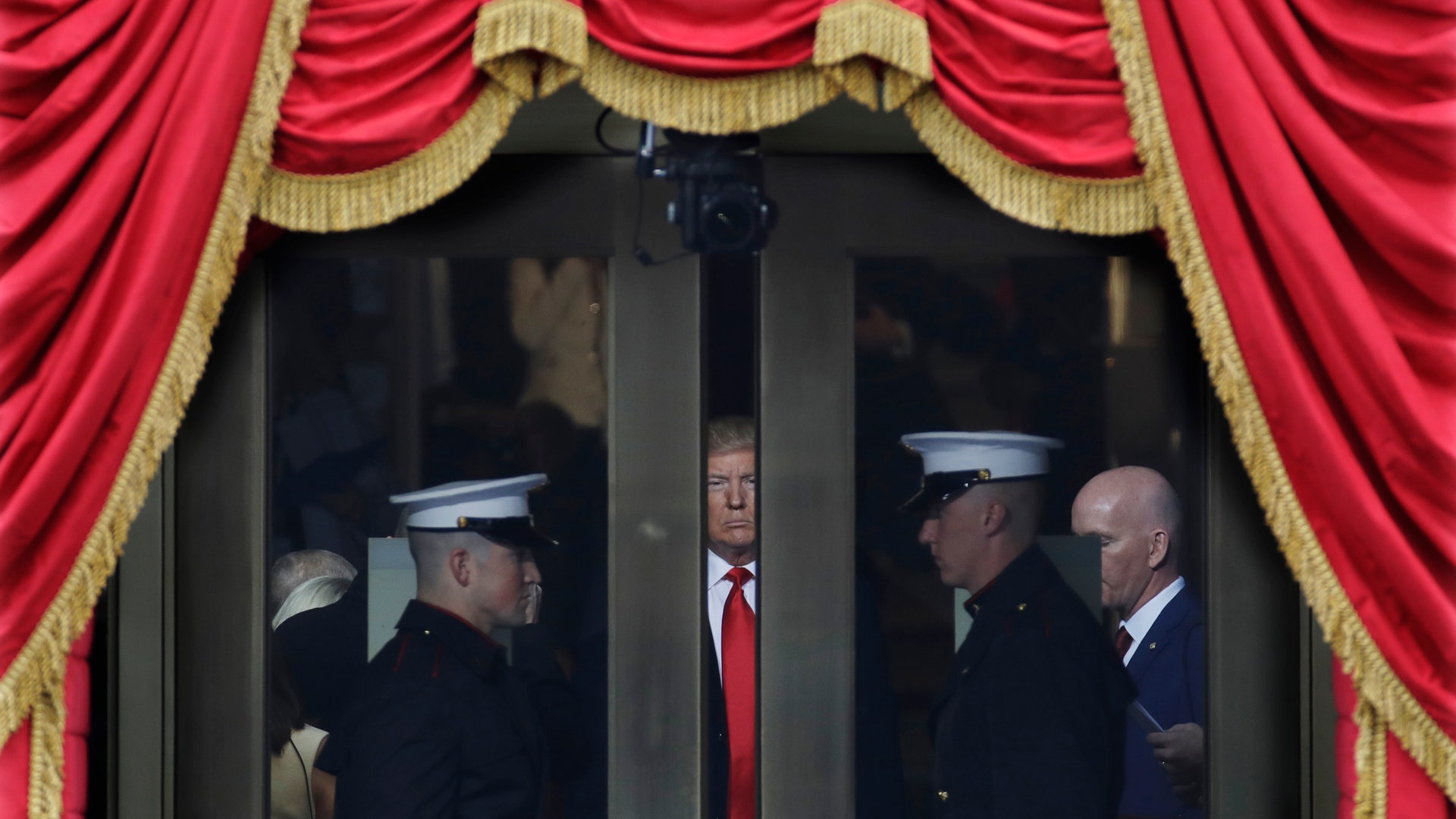 President-elect Donald Trump waits to stop out onto the portico for his Presidential Inauguration at the U.S. Capitol in Washington. 