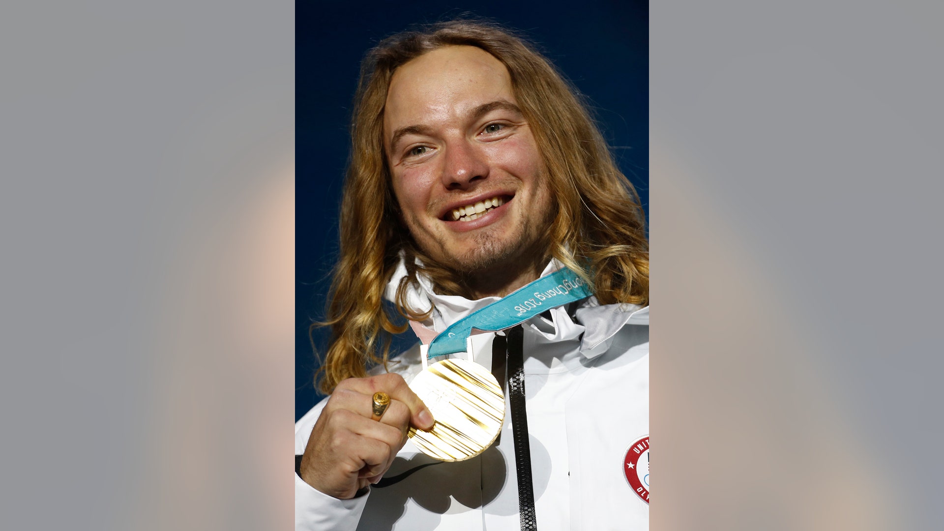 Gold medalist in the men's halfpipe David Wise of the United States, during the medals ceremony at the 2018 Winter Olympics