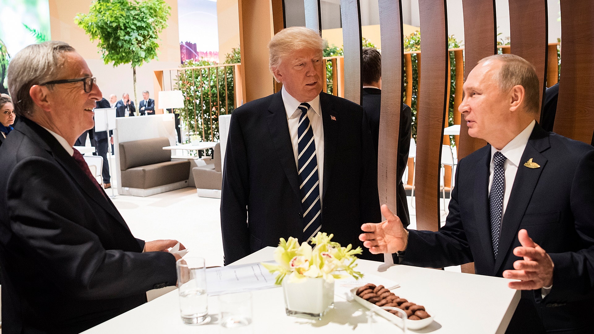 President Donald Trump, with Russian President Vladimir Putin and European Commission President Jean-Claude Juncker, at the G-20