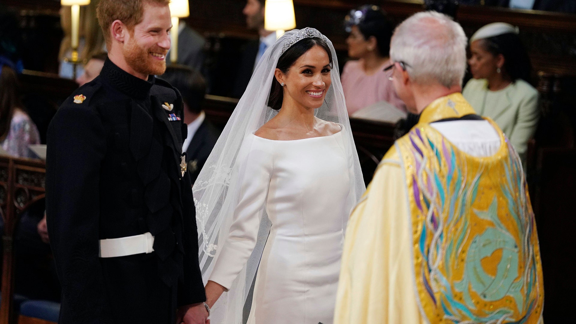 Prince Harry and Meghan Markle during their wedding service at St. George's Chapel in Windsor Castle