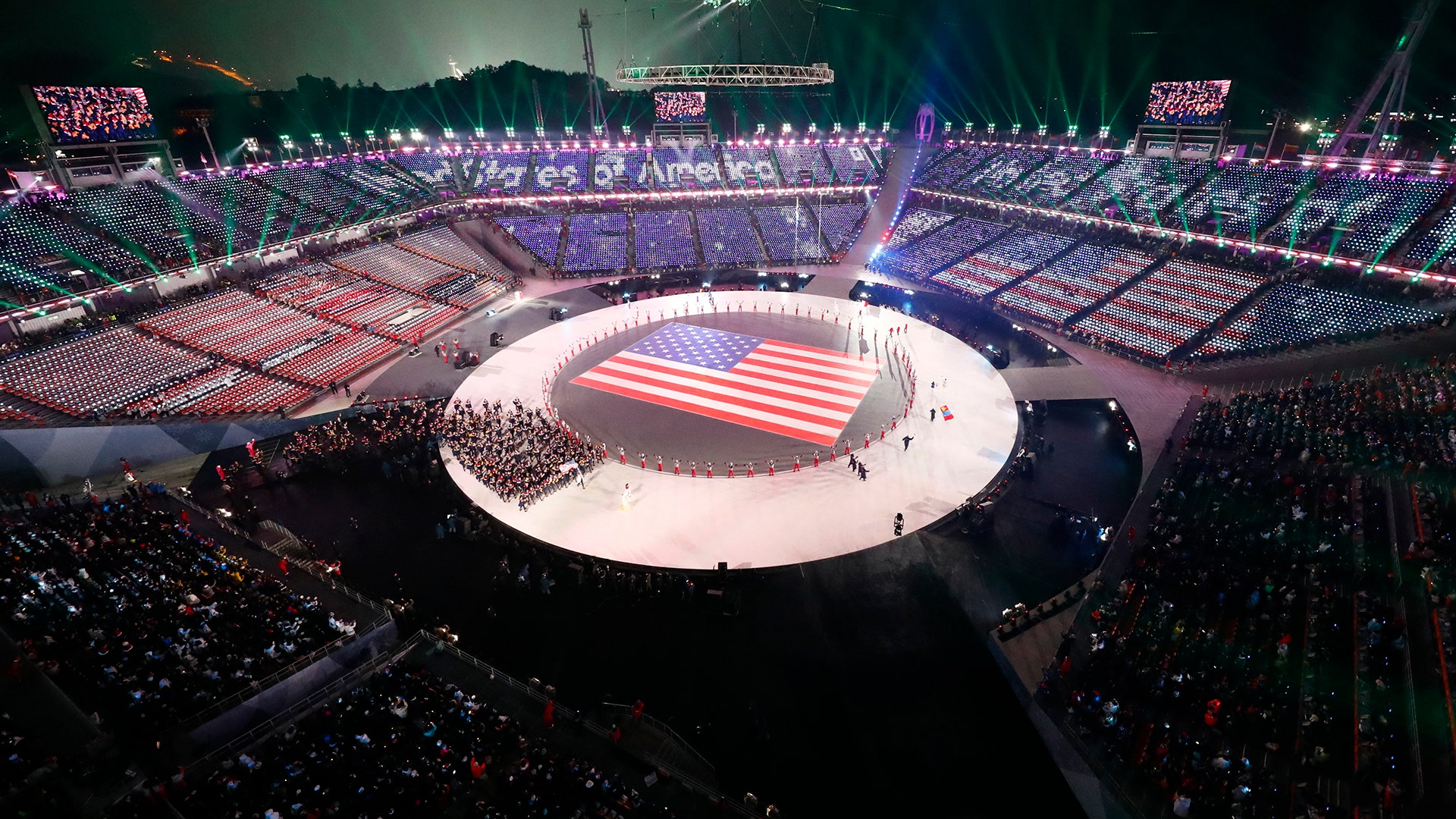 Athletes from the United States march in the opening ceremony of the Pyeongchang Winter Olympics, February 9, 2018