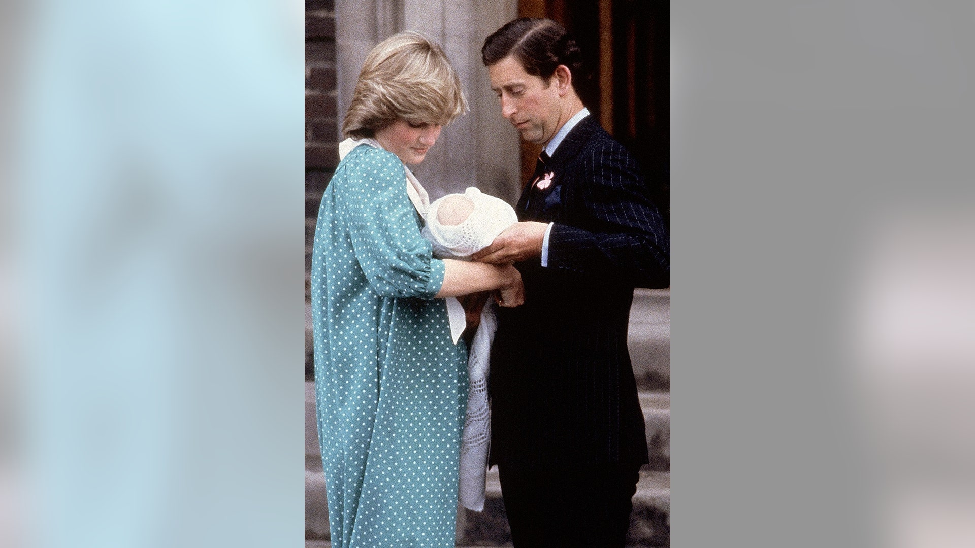 Princess Diana and Prince Charles look at their newborn son Prince William as they leave St. Mary's Hospital, in London, June 22, 1982