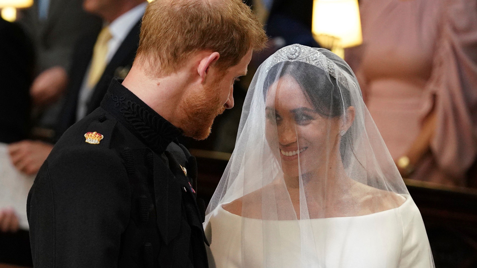 Britain's Prince Harry and Meghan Markle during their wedding ceremony in St. George's Chapel in Windsor Castle