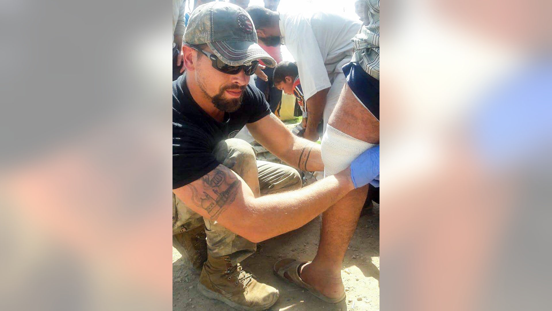 Sky Barkley giving medical care in Badush, Iraq, April 2017