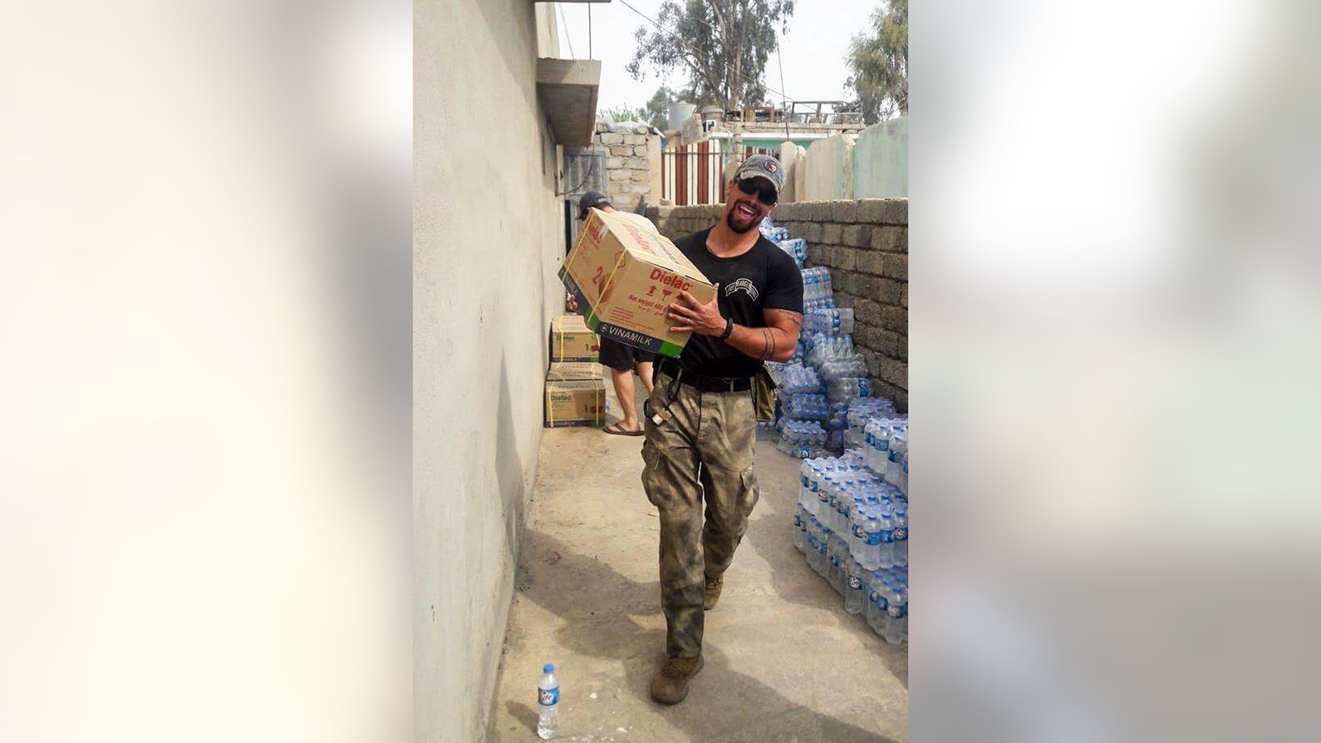 Sky Barkley helps distribute baby formula in Badush, Iraq, April 2017