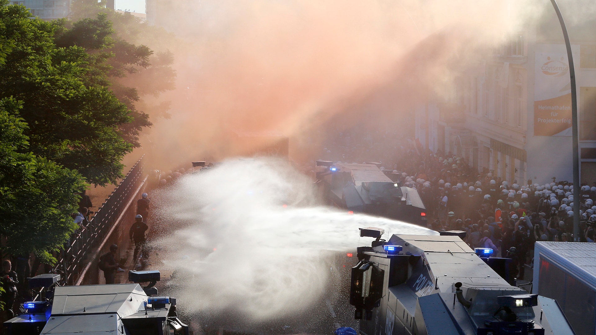 Police use water canons during a protest against the G-20 summit in Hamburg, Germany