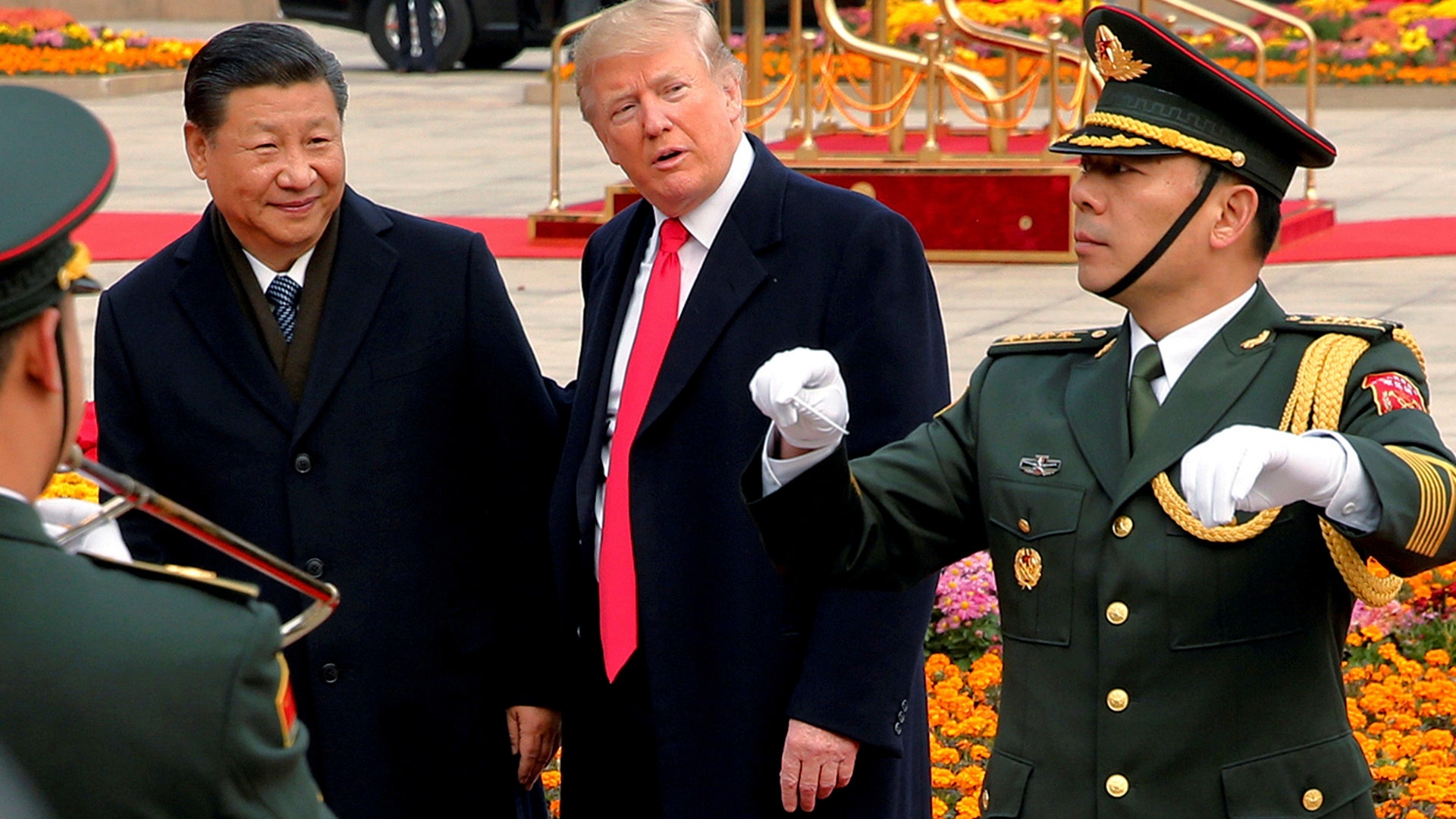 President Donald Trump with China's President Xi Jinping at a welcoming ceremony in Beijing, China, Thursday
