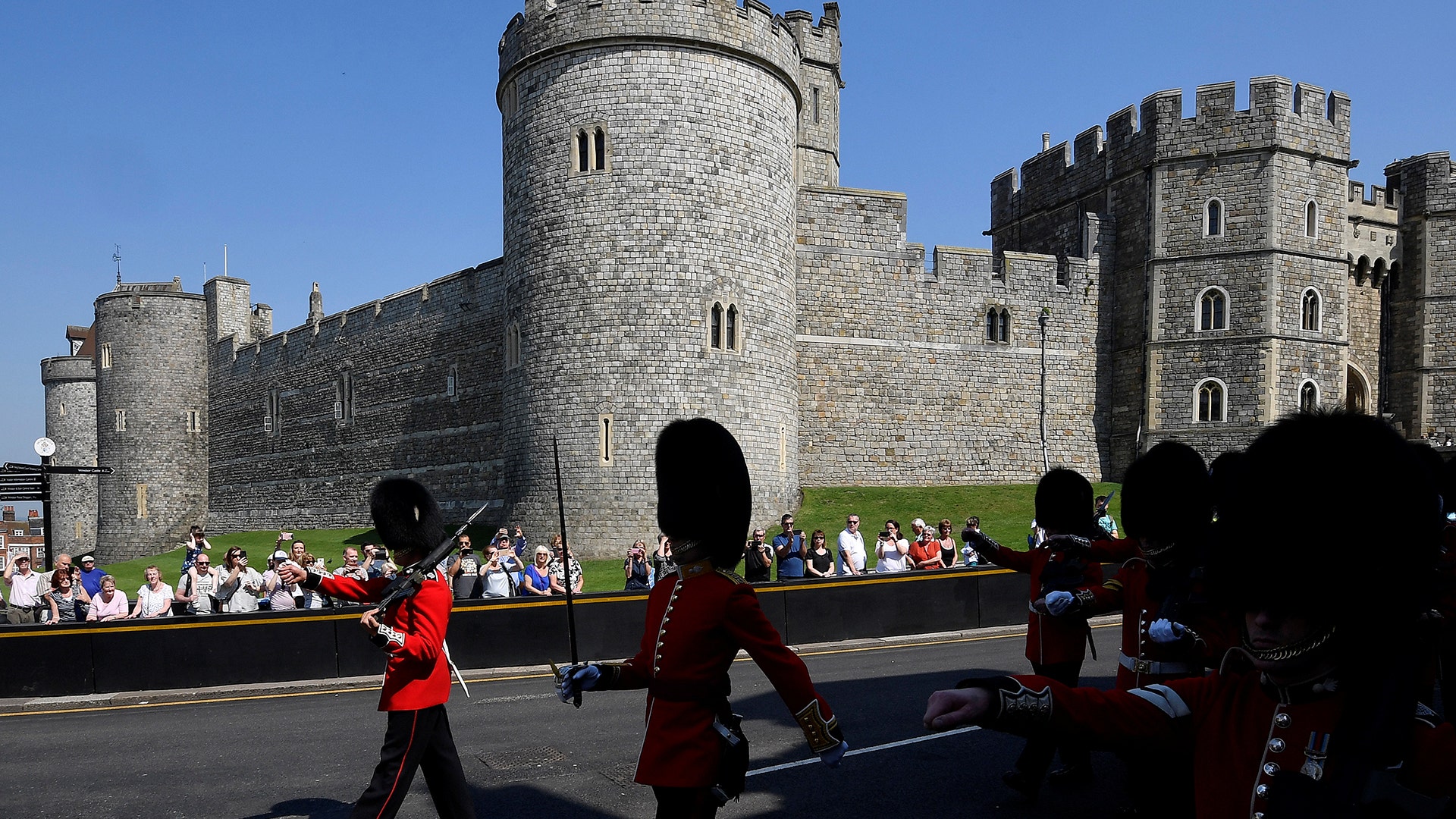 Members of the Household Cavalry march during the Changing of the Guard ceremony at Windsor Castle in Windsor, Britain, May 8, 2018