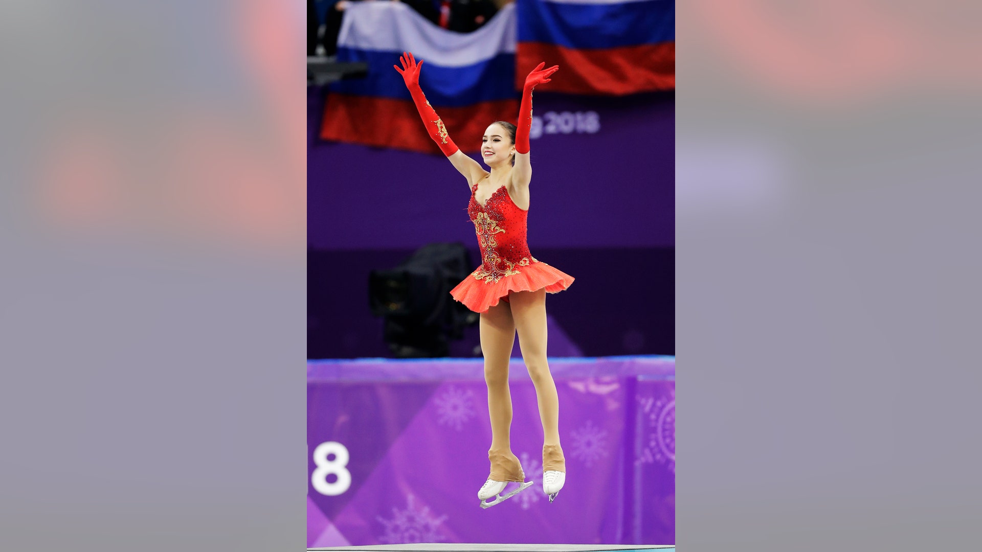 Alina Zagitova of the Olympic Athletes of Russia celebrates after winning the gold medal in the women's free figure skating final