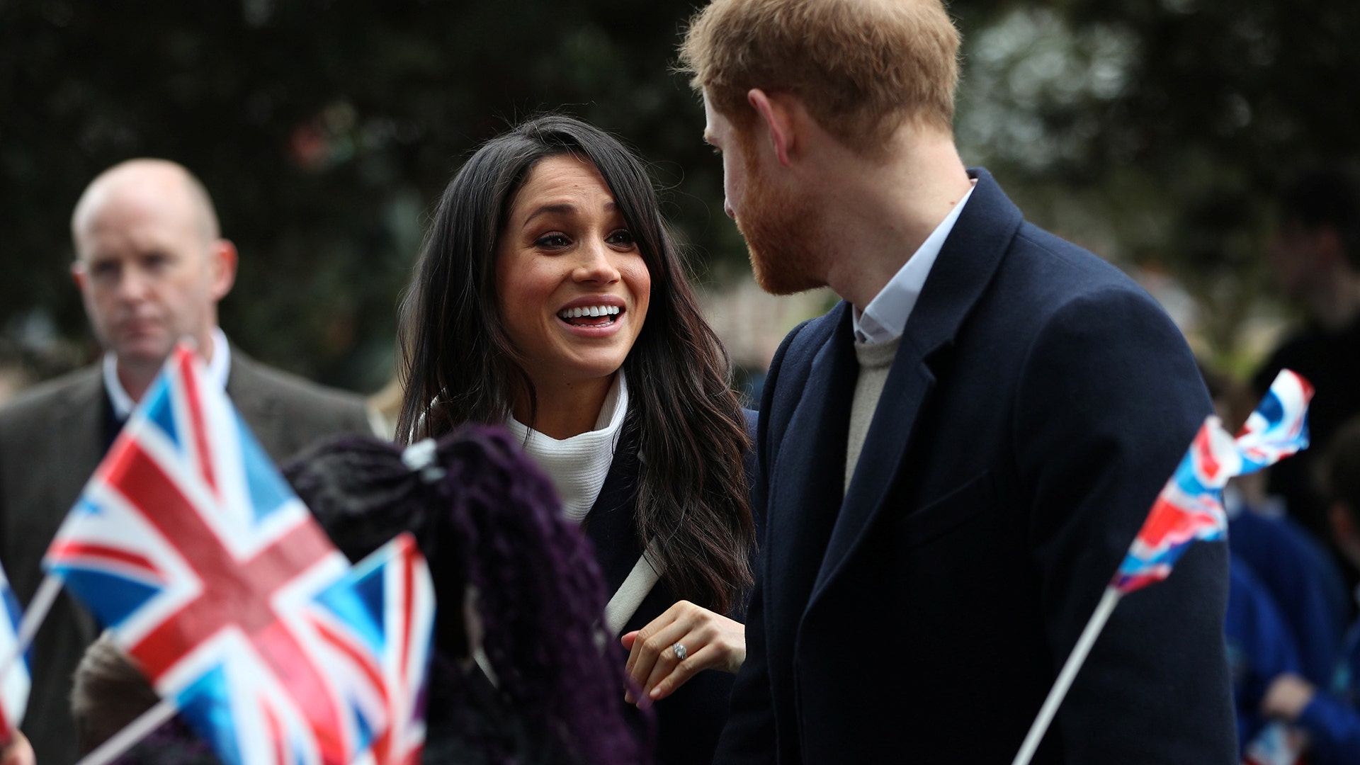 Britain's Prince Harry and his fiancee Meghan Markle meet local school children during a visit to Birmingham, Britain, March 8, 2018