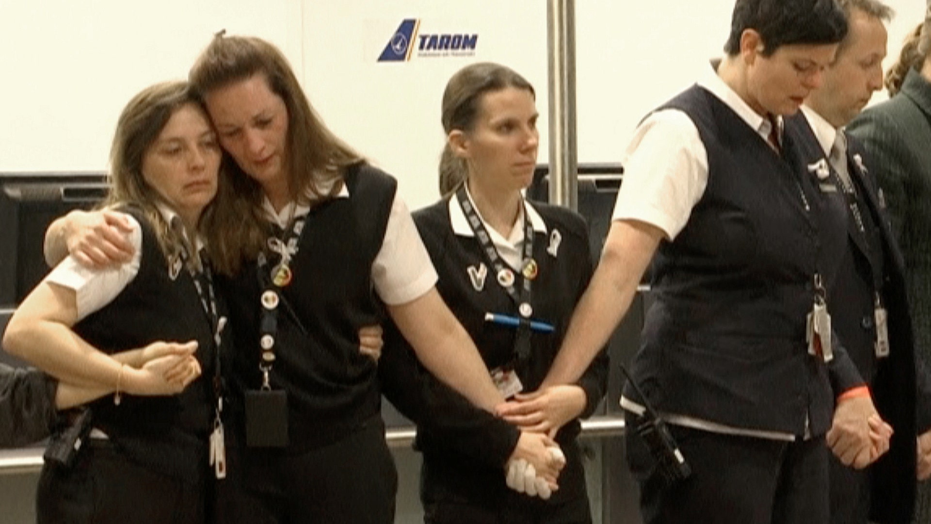 A still image taken from a video shows staff members of Zaventem airport taking part in a ceremony, March 22, 2017. 