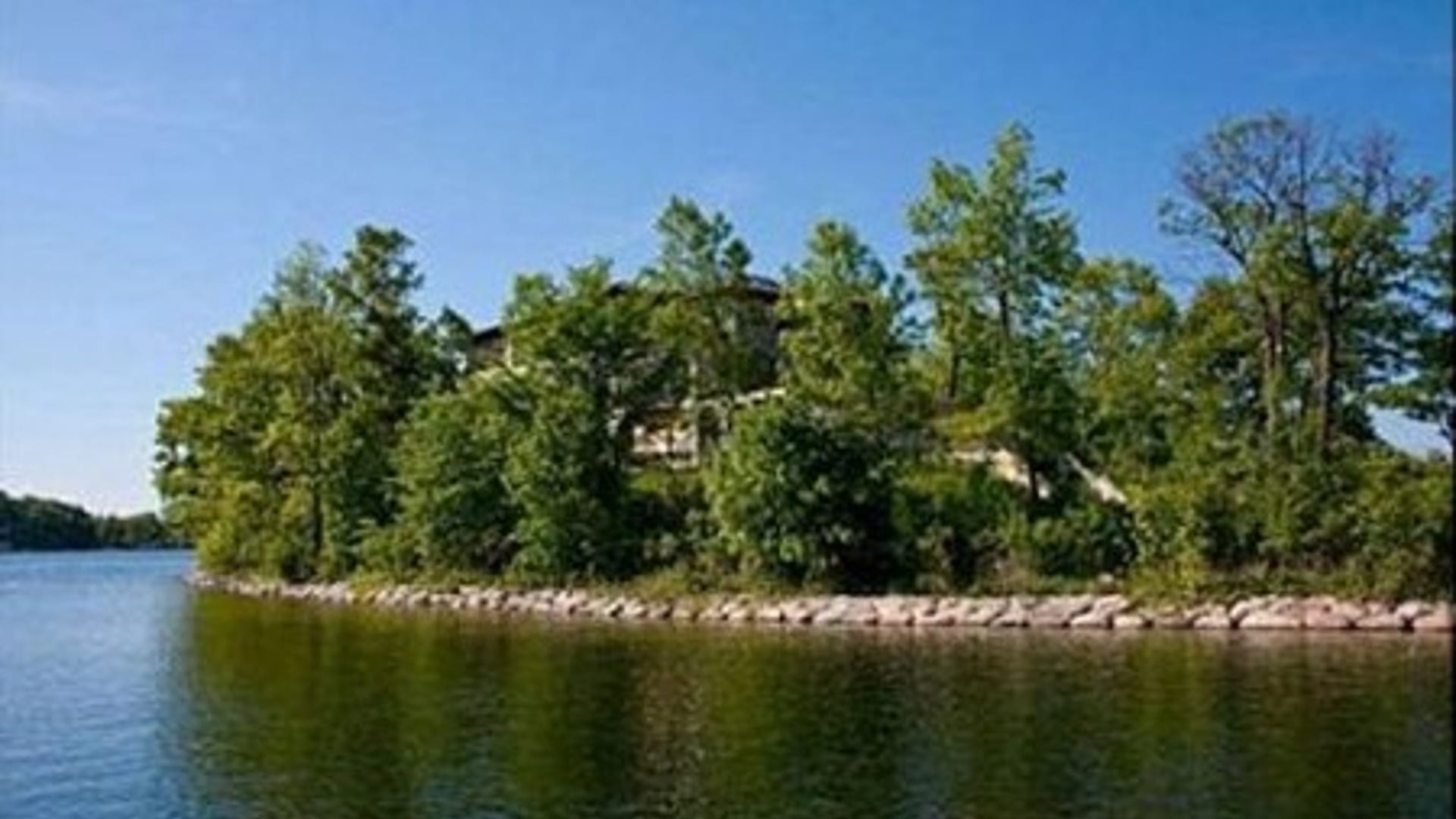 5560 Maple Heights Rd Greenwood, MN. For Sale: $3,950,000. The state motto is "Land of 10,000 Lakes," so it’s no surprise that Minnesota has a private island home or two for sale. This home for sale is located in St. Albans Bay and has 1,188 of lake shore. According to the property listing, the home is still under construction and is being sold as is. The walls of the 18,674-square-foot home are up, but additional work is needed to finish off the four-bedroom, five-bath home. The partially constructed island retreat is currently listed on the Greenwood real estate market for $3.95 million.