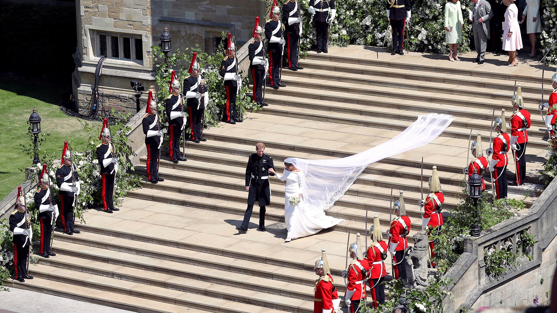 Prince Harry and Meghan Markle leave after their wedding ceremony at St. George's Chapel in Windsor Castle