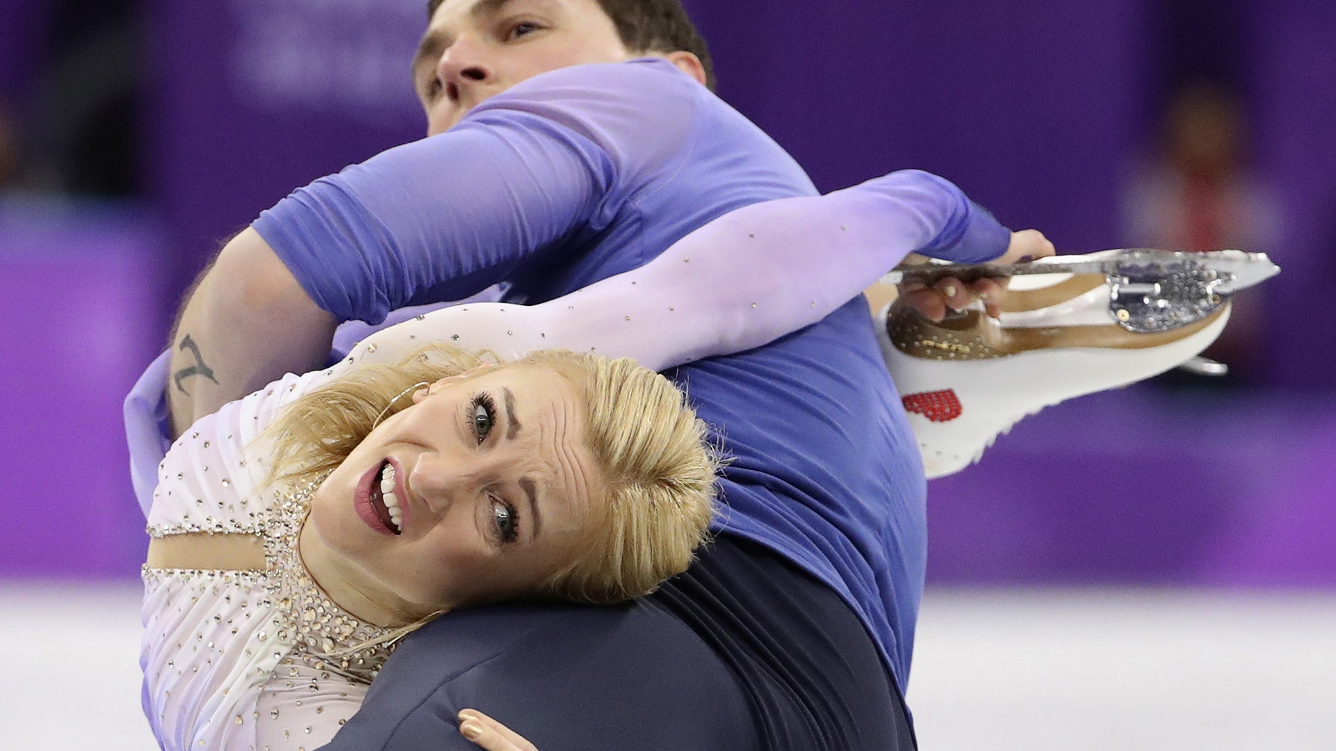 Aljona Savchenko and Bruno Massot of Germany win the gold medal in pairs figure skating at the Pyeongchang 2018 Winter Olympics