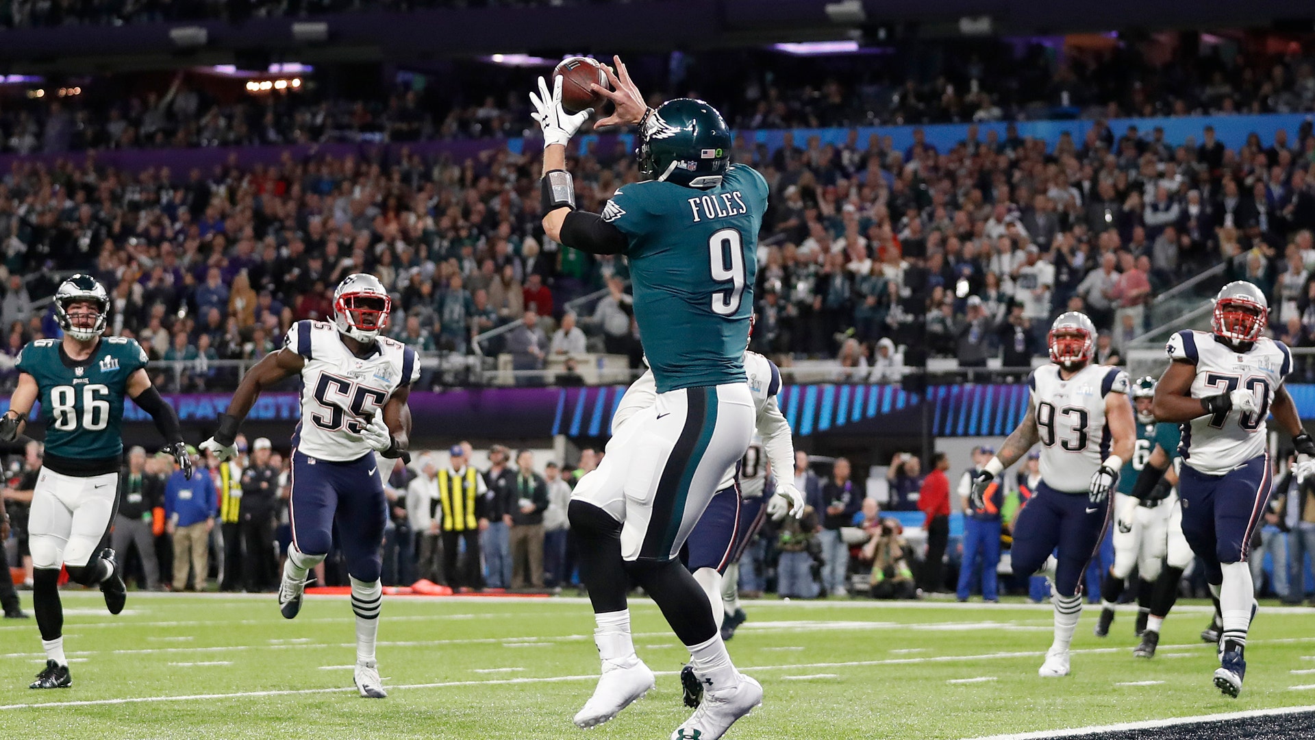 Philadelphia Eagles' Nick Foles catches a touchdown pass during the first half of Super Bowl 52 against the New England Patriots