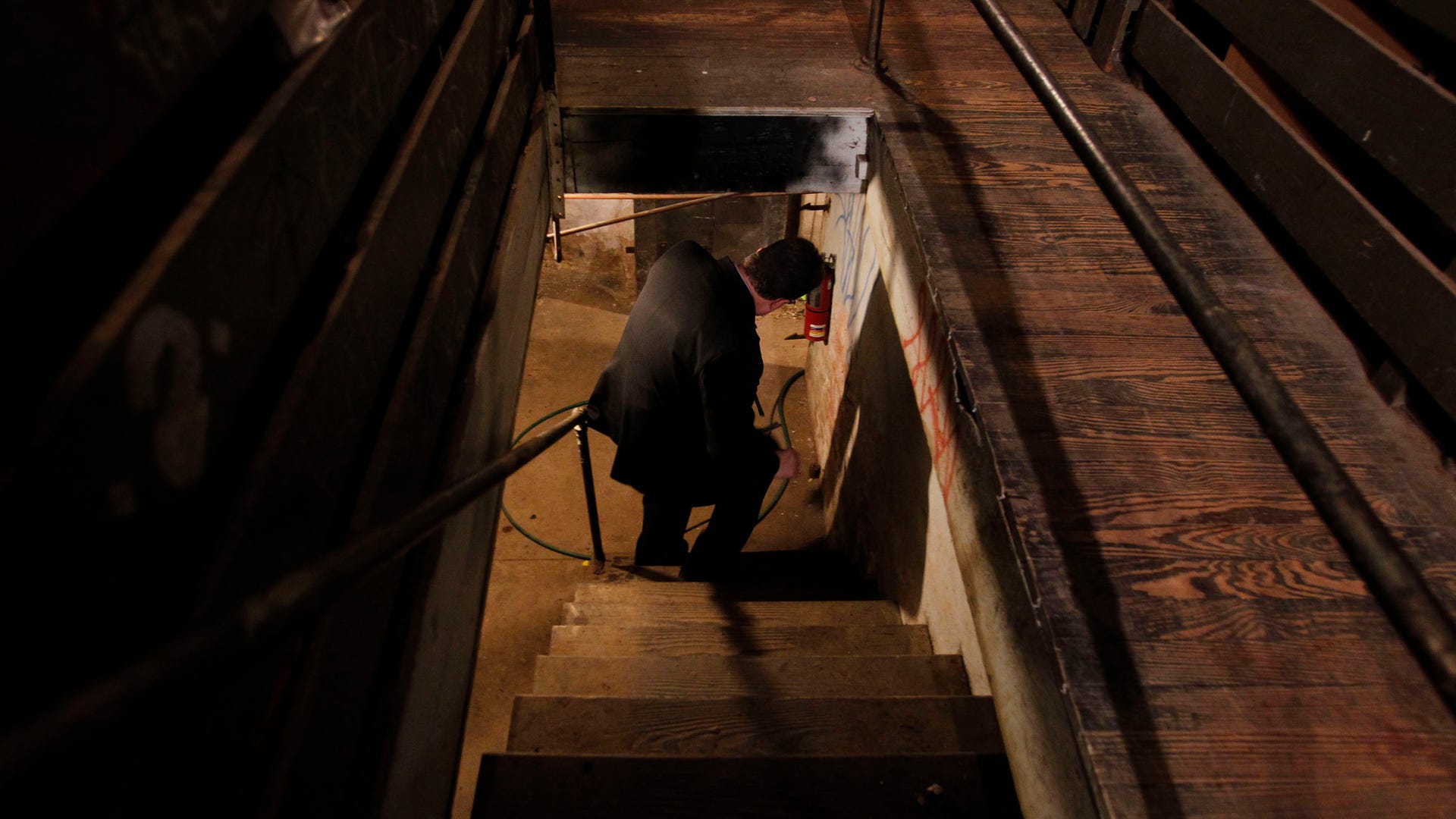 Sgt. Joseph Green walks to basement