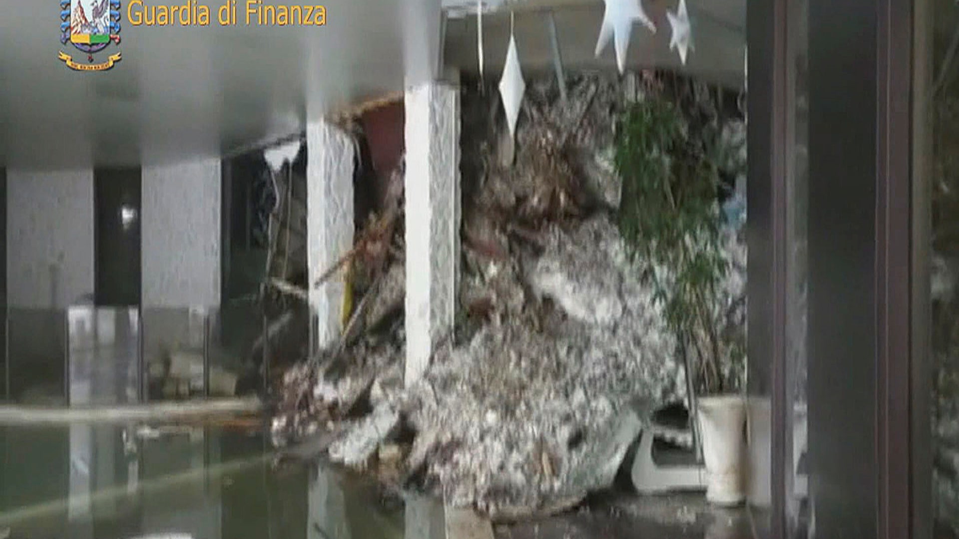 A photo taken from a video shows the snow inside the Hotel Rigopiano in Farindola, central Italy, after it was hit by an avalanche.