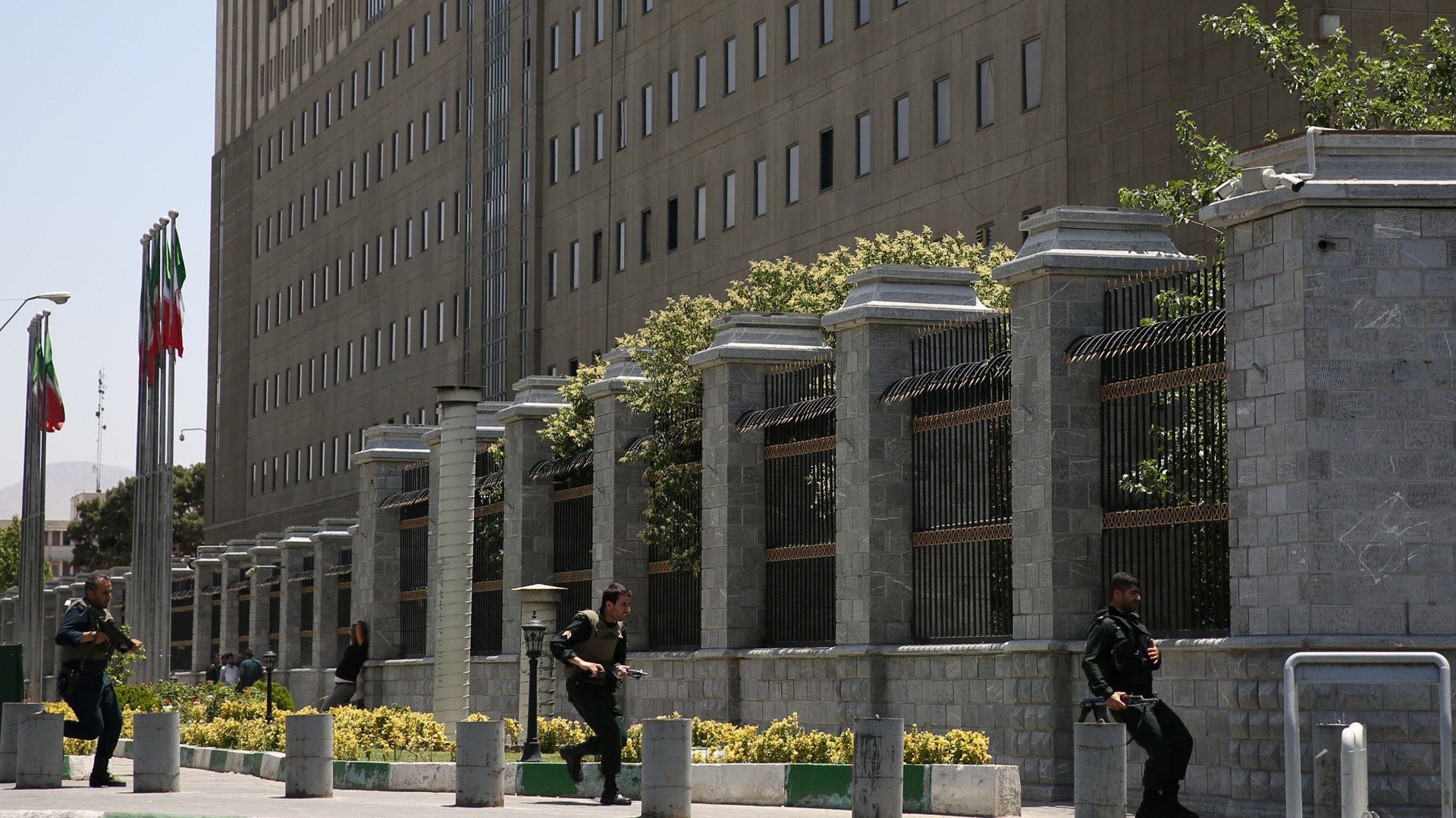 Members of Iranian forces during a gunmen attack at the parliament's building