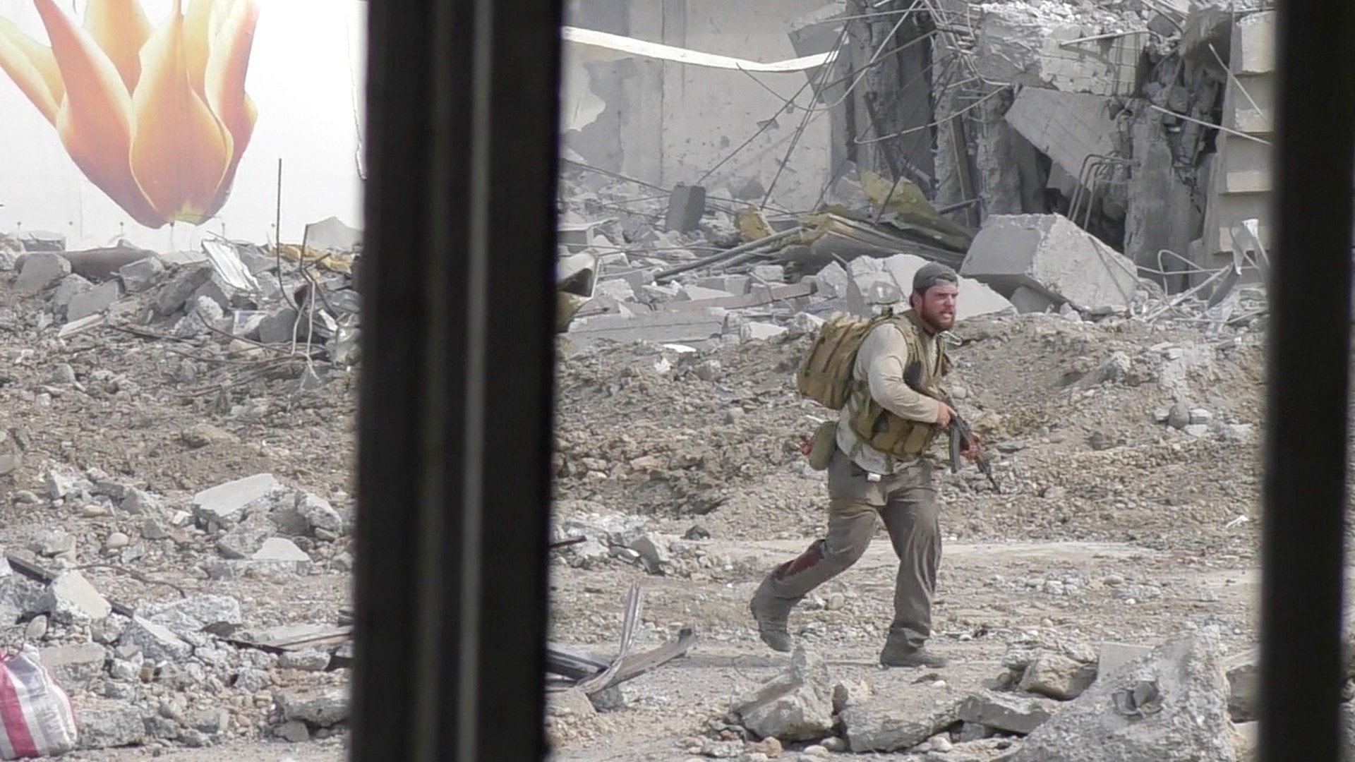 Ephraim Mattos is shot in the calf as he runs through ISIS fire to deliver the message that the team needs a Humvee for transport, June 2, 2017