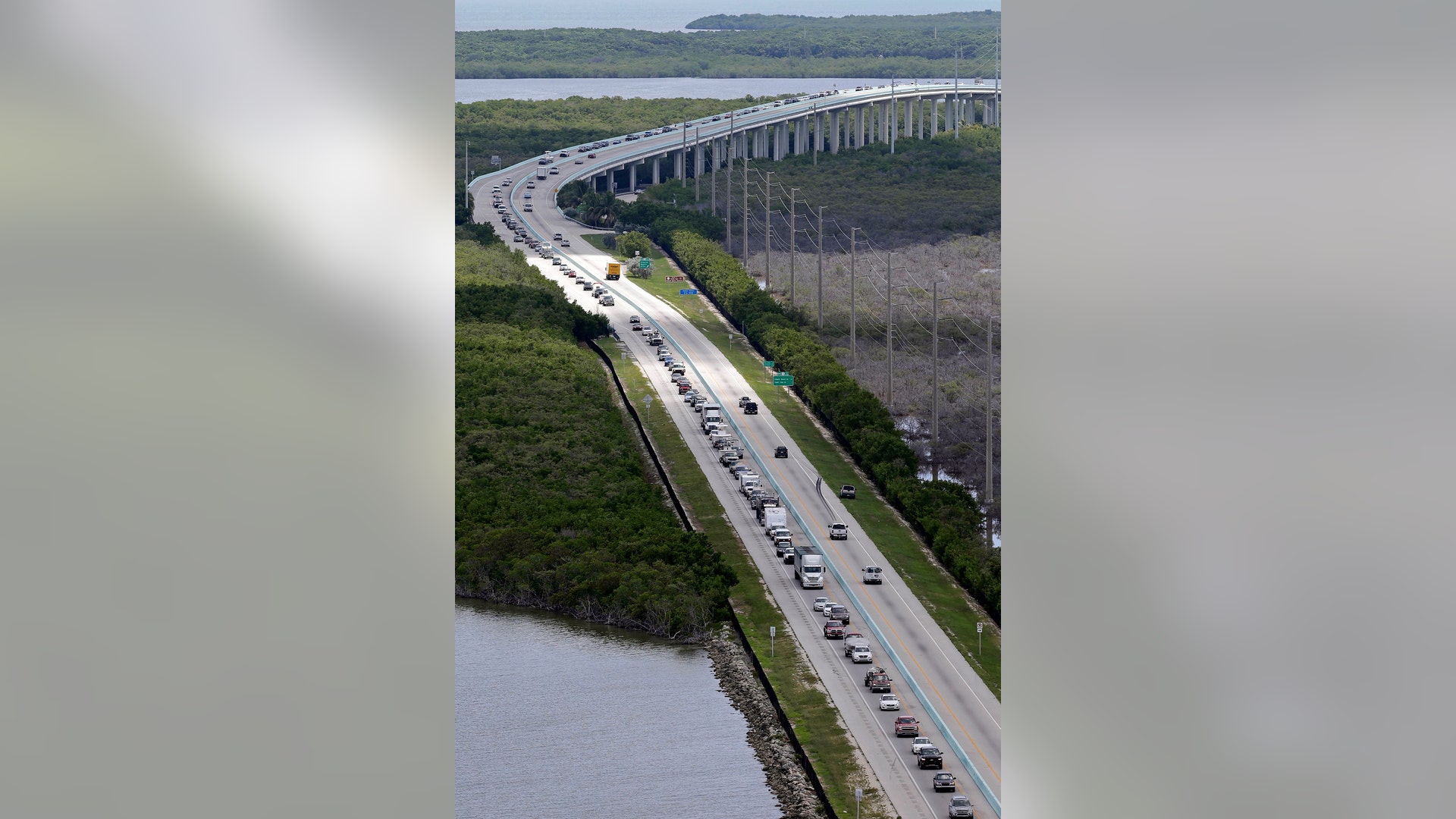 Motorists head north on US 1, Wednesday, in Key Largo, Fla., in anticipation of Hurricane Irma